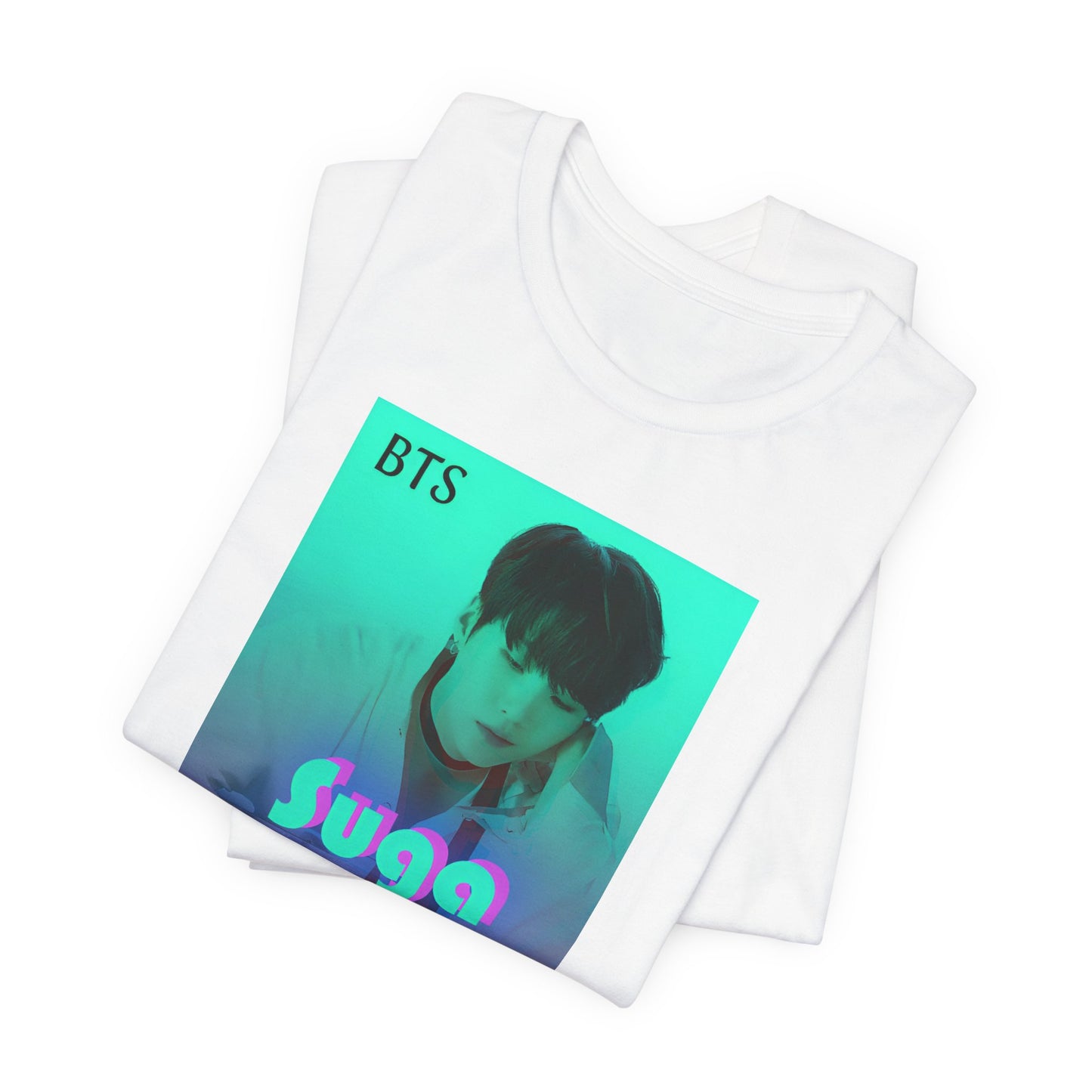 Folded Unisex airlume combed & ring-spun cotton T-shirt in white, featuring Suga of BTS (Agust D) in cyan, looking into a mirror. His lavender reflection appears glitched, starting at his right hand. The surreal gradient and distortion suggest a drifting, dreamlike moment out of sync with reality. From ModeK Vetements.