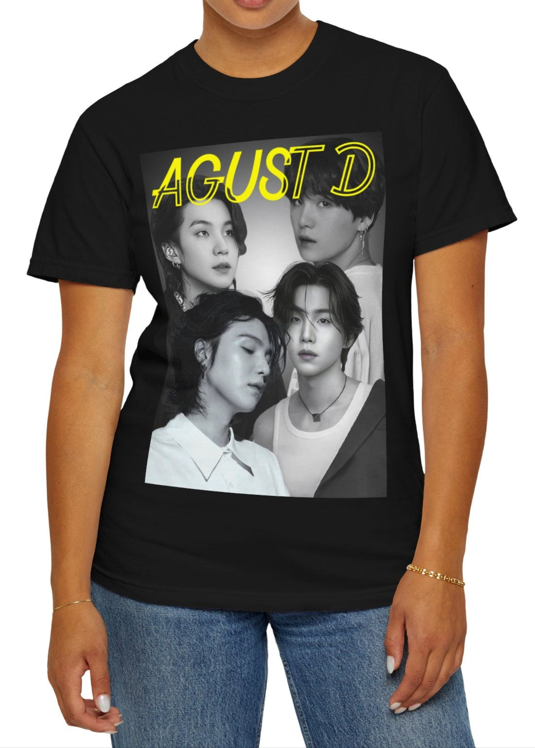 Agust D | SUGA BTS Unisex T-Shirt in black – Monochrome Collage. A bold black-and-white collage featuring multiple portraits of Agust D and SUGA, with a transparent-outlined text effect for a modern, artistic touch. ModeK Vetements.