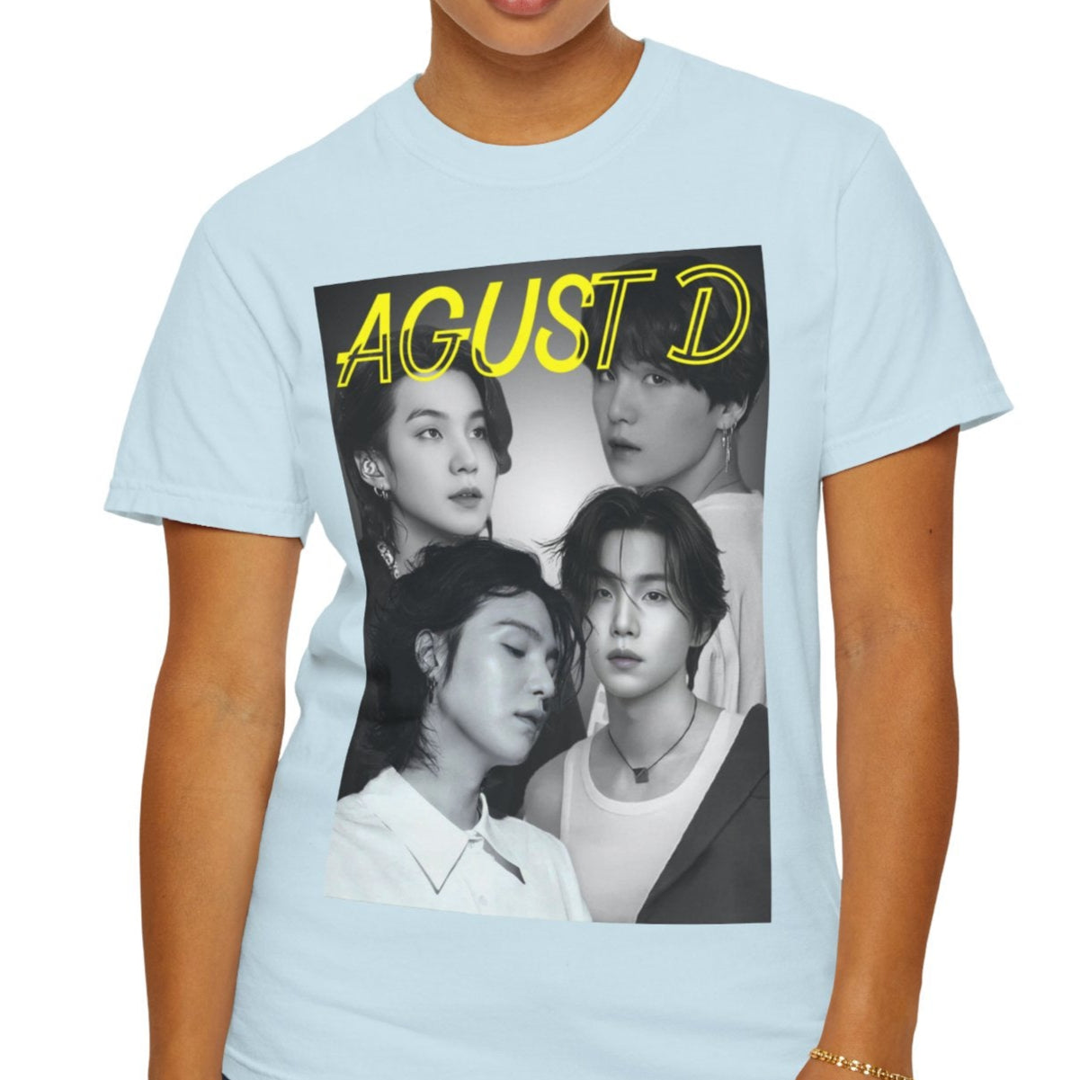 Agust D | SUGA BTS Unisex T-Shirt in chambray – Monochrome Collage. A bold black-and-white collage featuring multiple portraits of Agust D and SUGA, with a transparent-outlined text effect for a modern, artistic touch. ModeK Vetements.