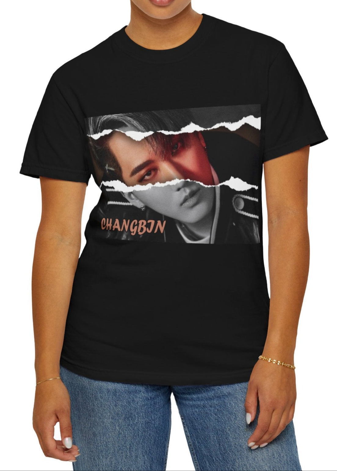 Changbin Stray Kids Unisex T-Shirt in black – Ripping the Stage. A bold design featuring Changbin with a torn paper effect revealing a mix of monochrome and intense red hues. The striking contrast mirrors his powerful stage presence and raw energy. ModeK Vetements.