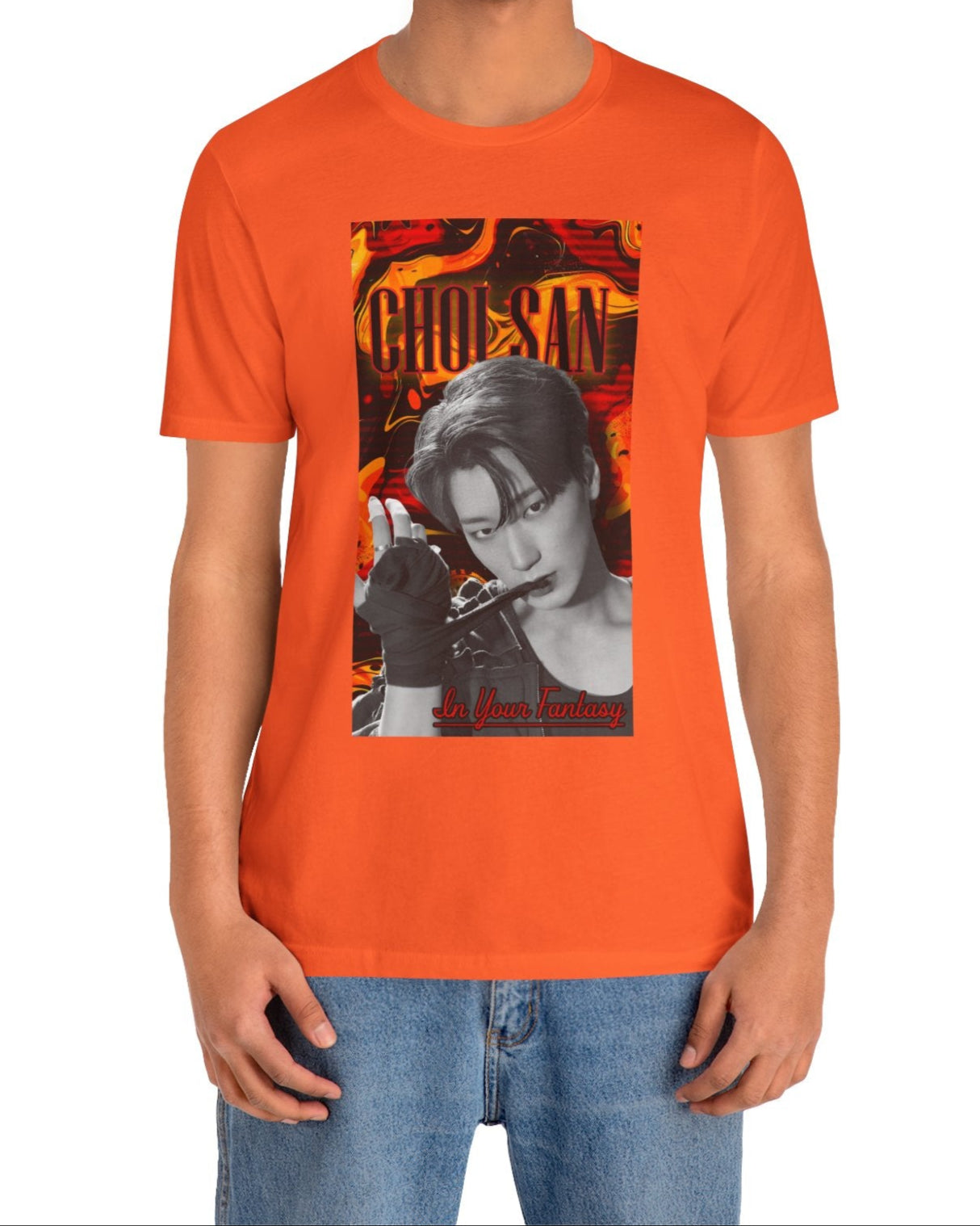 Unisex airlume cotton t-shirt in orange, featuring a Monochrome portrait of Choi San of ATEEZ biting a wrap, surrounded by glitch effects and a swirling Fire Engine Red and Gold Drop background. Red glowing text adds heat to the surreal, seductive atmosphere. From ModeK Vetements.