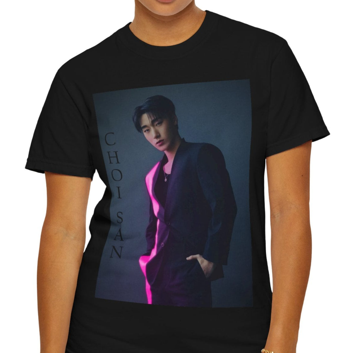 Choi San ATEEZ unisex T-shirt in black, featuring a striking neon pink line cutting through his sleek suit, set against cinematic shadows for a bold contrast. This high-impact design captures San’s poised presence and effortless charisma, printed on soft, breathable Airlume cotton for style and comfort. ModeK Vetements.