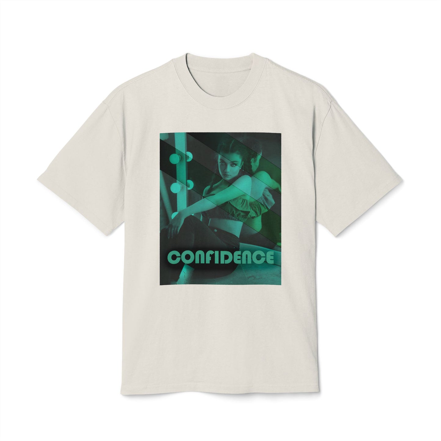 Draped Unisex carded cotton T-shirt in faded bone with a boxy fit, featuring a woman who sits in front of a softly lit vanity mirror, framed by diagonal tones of pine and sea green. Her expression is poised and calm, capturing quiet confidence without performance. From ModeK Vetements.