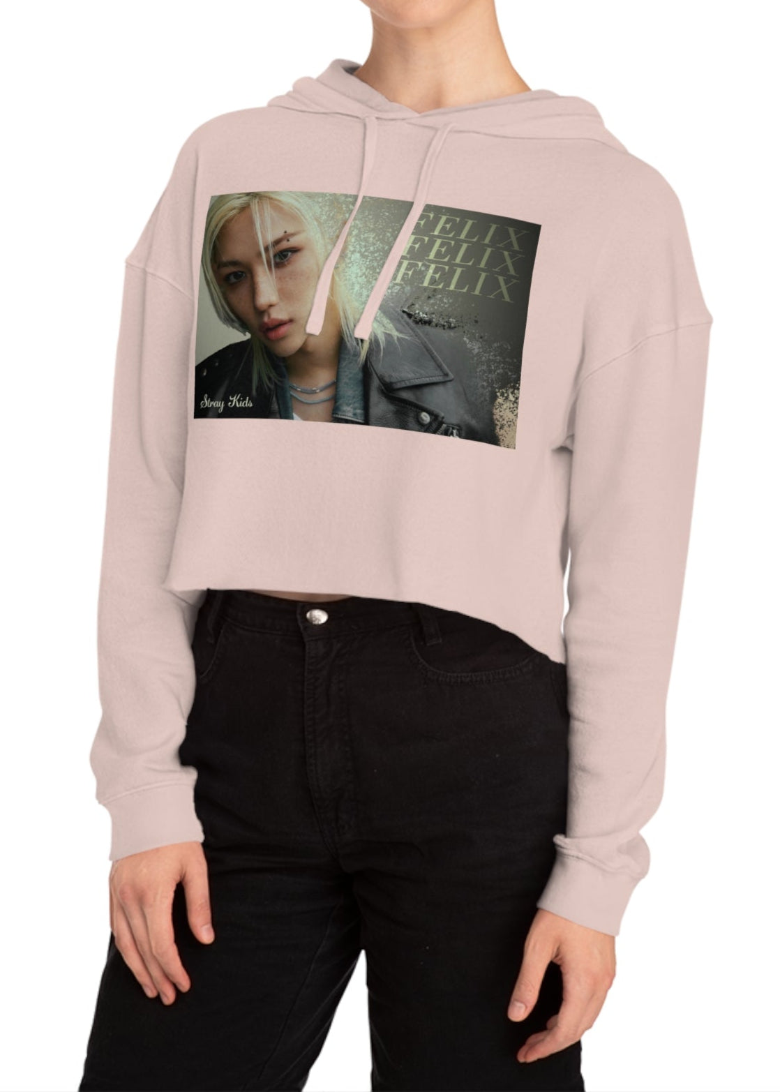 Felix Lee Stray Kids Unisex Cropped Hoodie in blush, featuring a soft gold gradient background, intense gaze, and sleek leather jacket. The dust-like texture and Felix typography add an ethereal, charismatic touch. Made from a soft cotton blend with a relaxed cropped fit for comfort and style. From ModeKVetements.