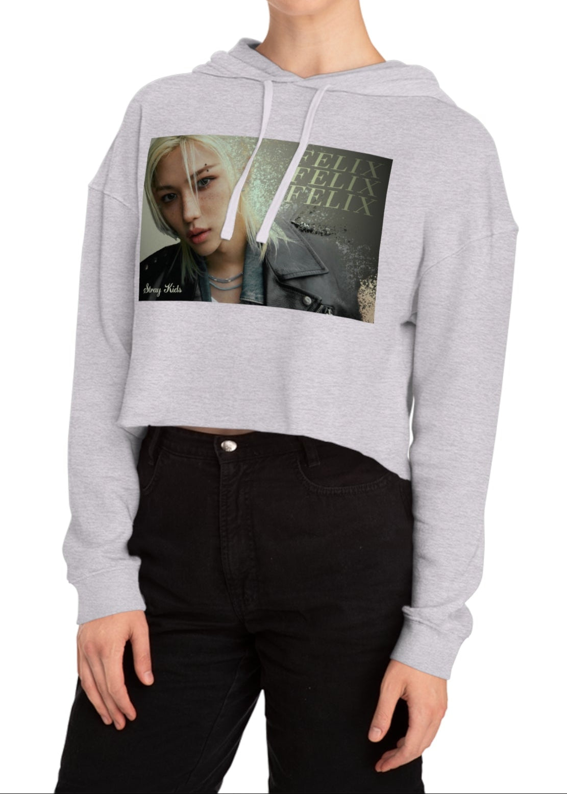 Felix Lee Stray Kids Unisex Cropped Hoodie in grey heather, featuring a soft gold gradient background, intense gaze, and sleek leather jacket. The dust-like texture and Felix typography add an ethereal, charismatic touch. Made from a soft cotton blend with a relaxed cropped fit for comfort and style. From ModeKVetements.