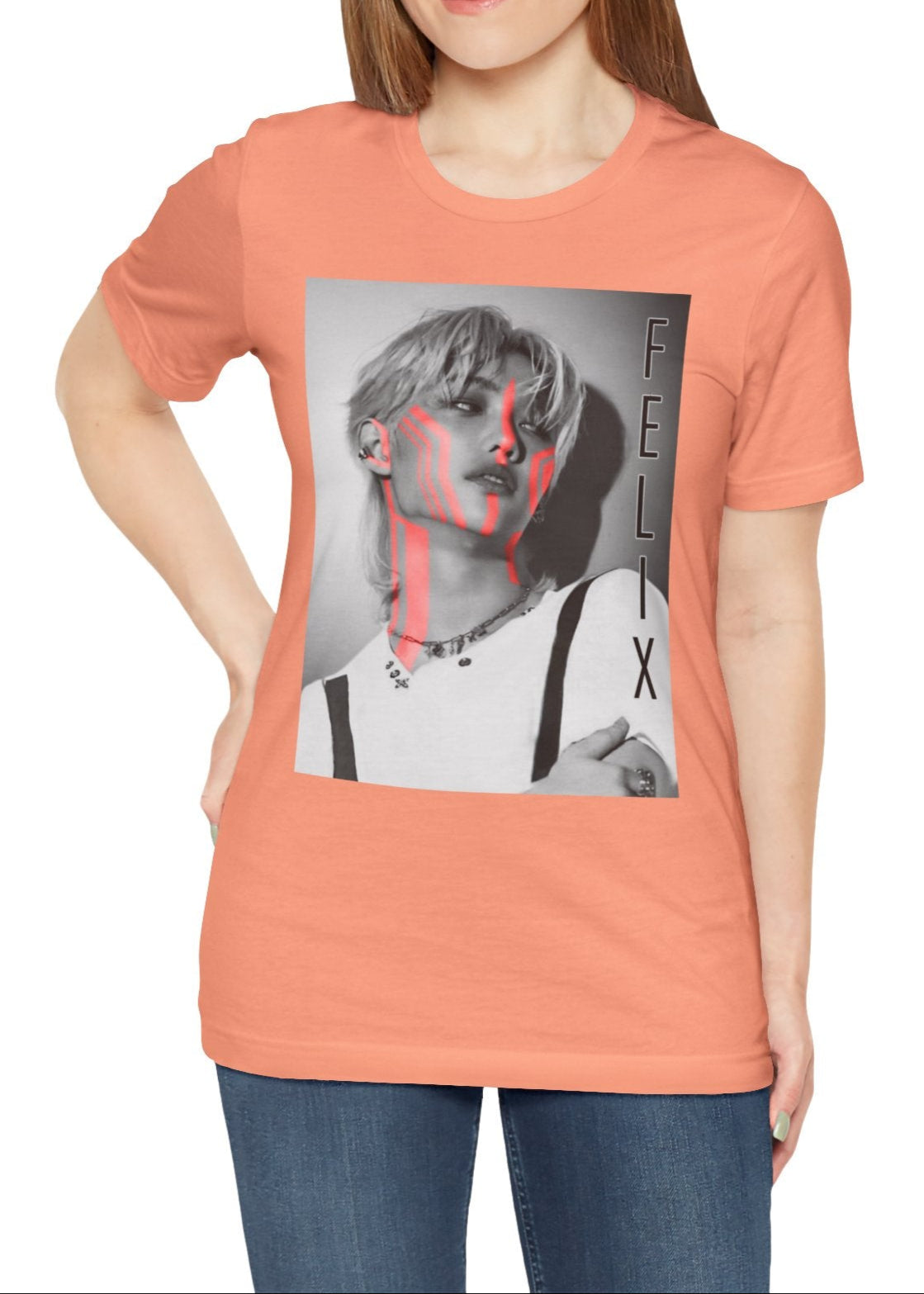 Felix Lee Stray Kids unisex T-shirt in sunset, featuring a monochrome portrait with bold neon pink accents. The design contrasts soft grayscale tones with futuristic neon highlights, creating a modern and artistic look. Made from 100% Airlume cotton with a breathable, lightweight fit. From ModeKVetements.