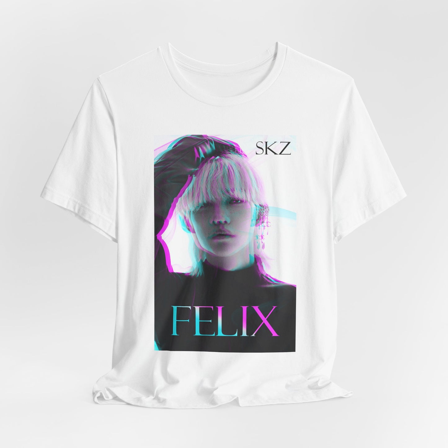 Draped white unisex t-shirt featuring Felix Lee from Stray Kids with a bold 3D glitch effect in cyan and magenta, blending futuristic and dreamlike aesthetics.