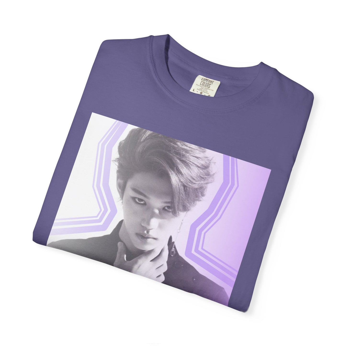Folded Unisex 100% ring-spun cotton T-Shirt in grape, featuring a black and white portrait of Stray Kids' Felix centered within purple geometric wave lines, with "FELIX" written in bold text at the bottom. From ModeK Vetements.