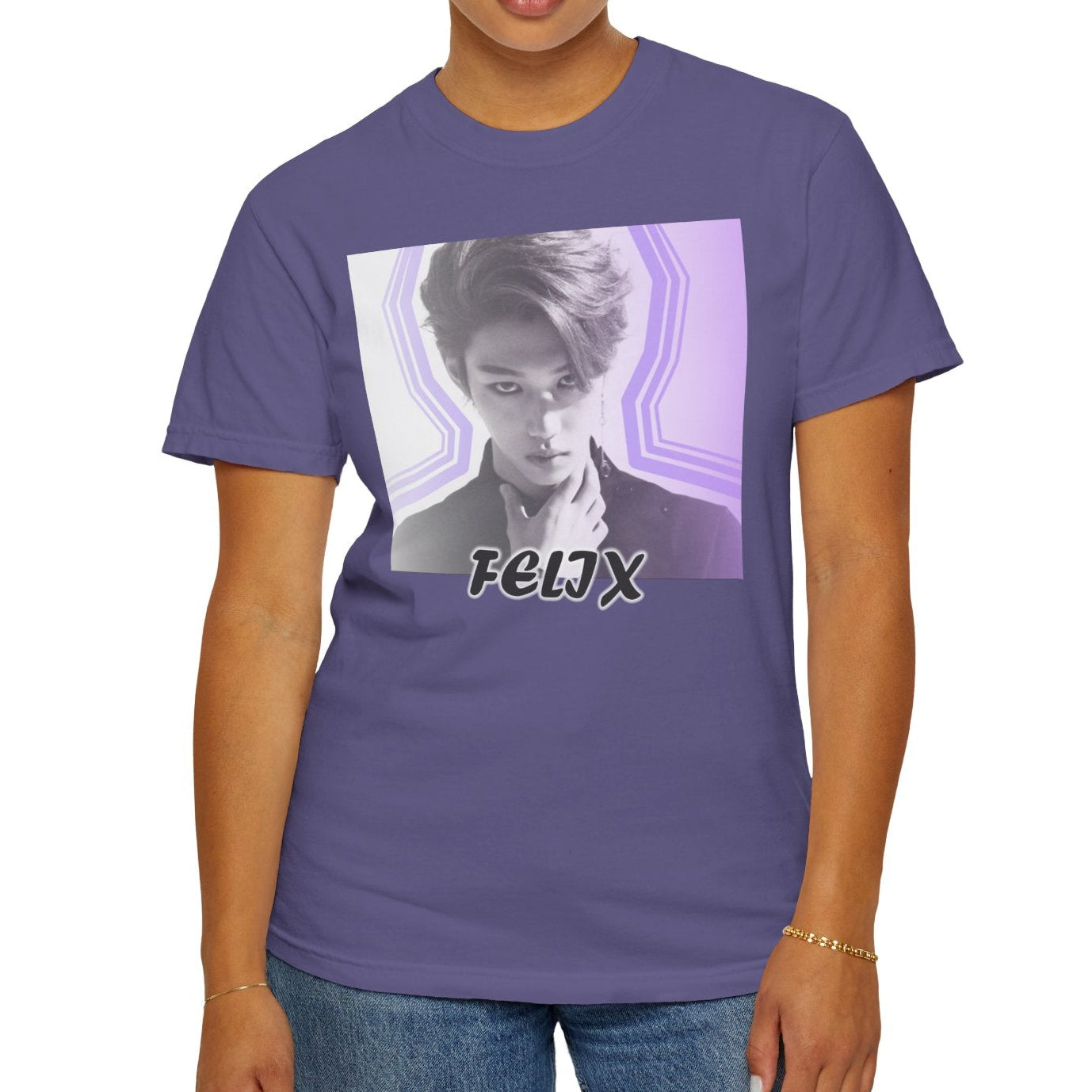 Unisex 100% ring-spun cotton T-Shirt in grape, featuring a black and white portrait of Stray Kids' Felix centered within purple geometric wave lines, with "FELIX" written in bold text at the bottom. From ModeK Vetements.