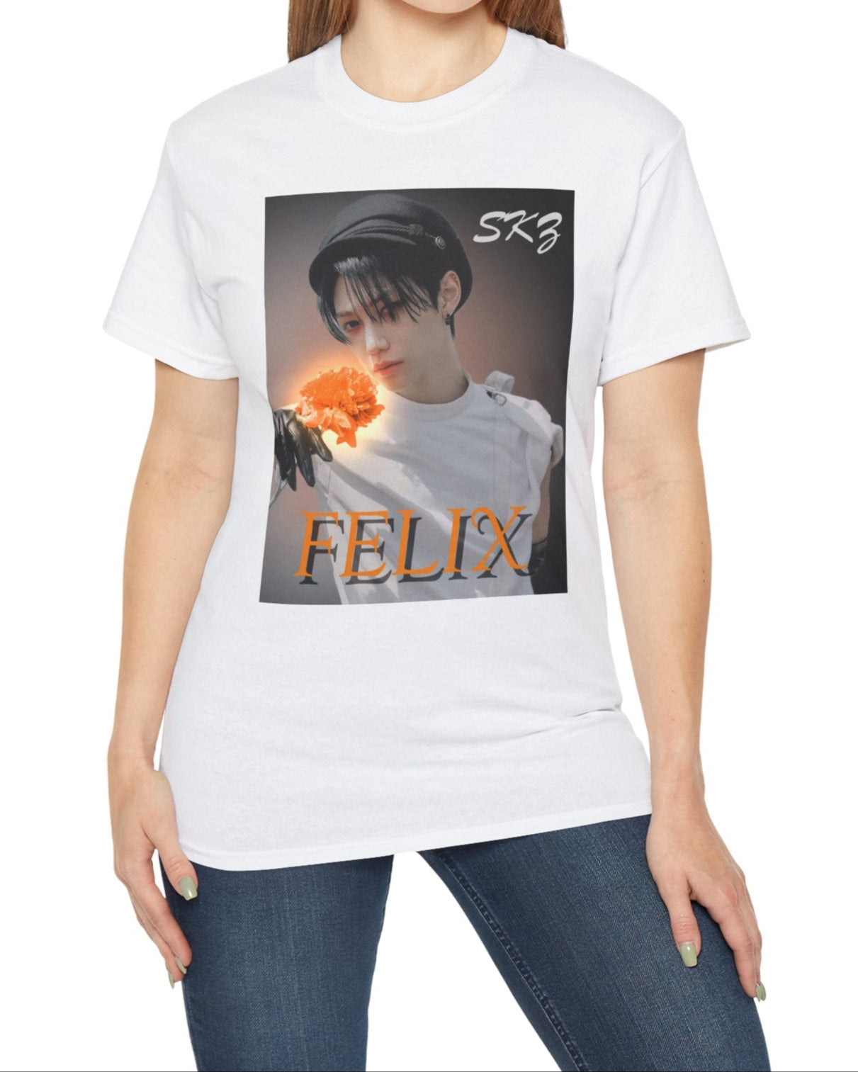 Felix Stray Kids unisex T-shirt in white, inspired by the 143 MV. Features Felix in white costume with glowing orange flower, contrasted against a dark, cinematic background. ModeK Vetements.