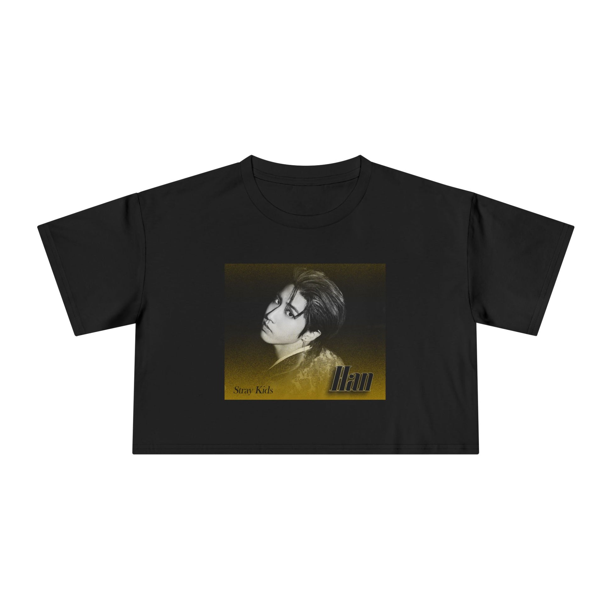 Flat women's crop t-shirt in black, featuring Han from Stray Kids in a monochrome portrait, with a golden dispersion effect blending into a black background. The design captures a cinematic, ethereal vibe. From ModeK Vetements.