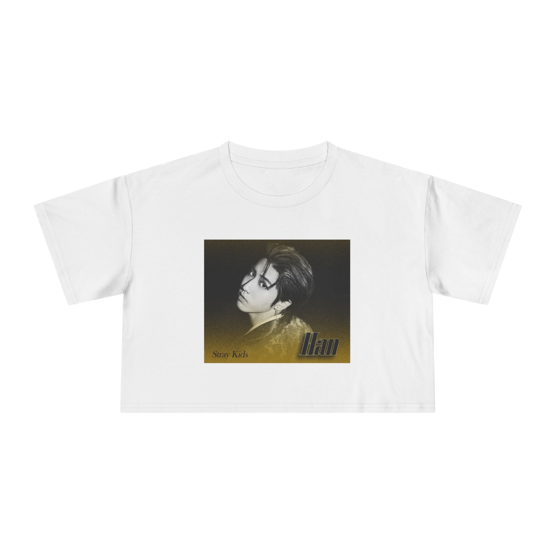 Flat women's crop t-shirt in white, featuring Han from Stray Kids in a monochrome portrait, with a golden dispersion effect blending into a black background. The design captures a cinematic, ethereal vibe. From ModeK Vetements.