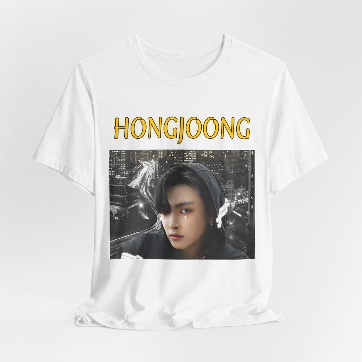 Draped Hongjoong ATEEZ Unisex T-Shirt in white, featuring neon light trails and a striking cityscape. A bold design capturing his rebellious vision and artistic energy. ModeK Vetements.