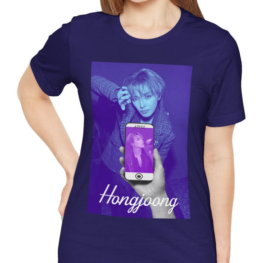 Unisex t-shirt in team navy, from airlume combed and ringspun cotton, featuring a Printed design of Hongjoong from ATEEZ in a surreal phone screen composition. The background in blueberry contrasts with a purple-toned image on the phone, evoking alternate perspectives or layered realities. From ModeK Vetements.