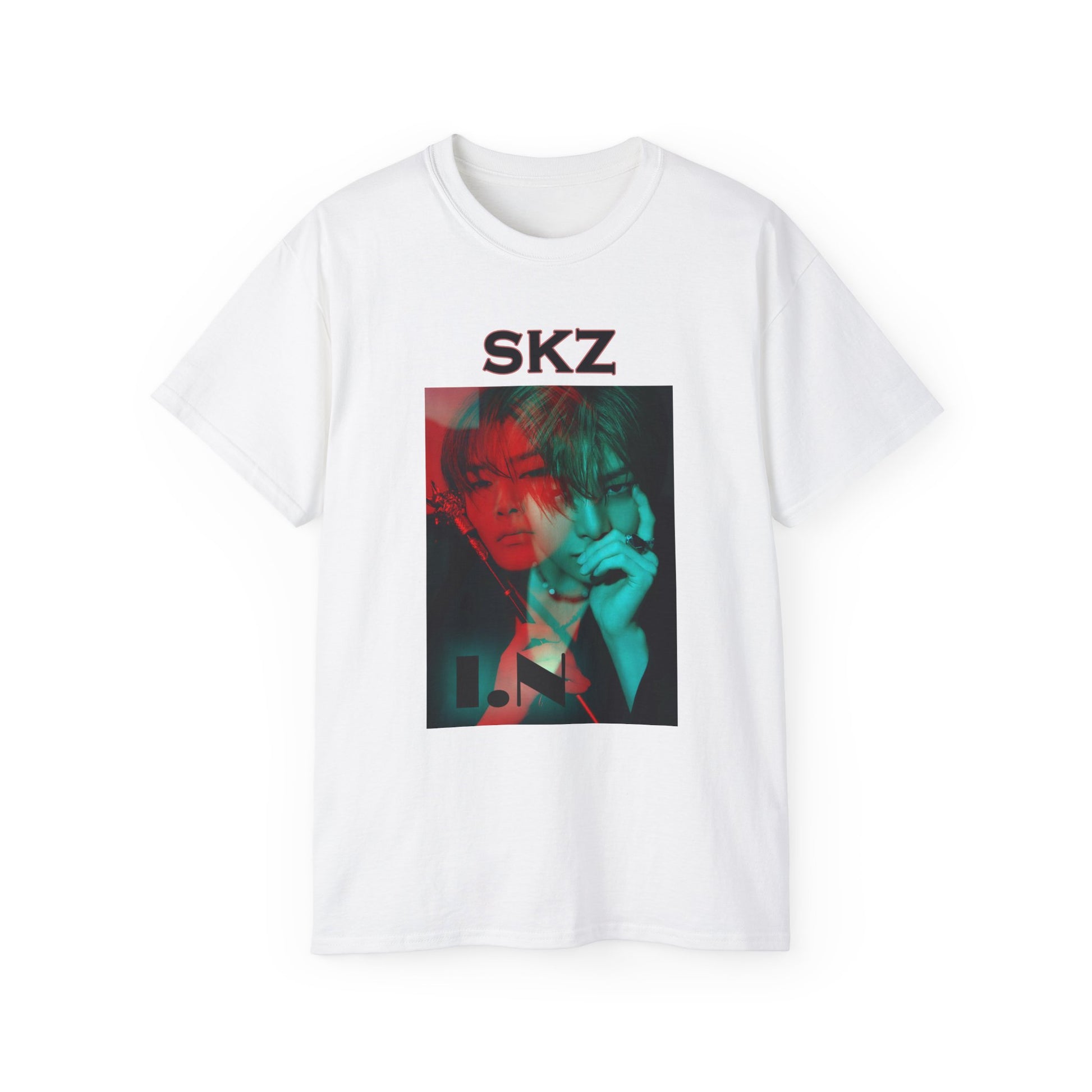 Draped I.N Stray Kids unisex T-shirt in white, featuring a bold black-and-white portrait with a dual-tone red and teal overlay. The striking 3D-like effect, combined with "SKZ" typography and I.N’s name, creates a modern, edgy aesthetic. Made from 100% cotton for lightweight comfort. From ModeKVetements.
