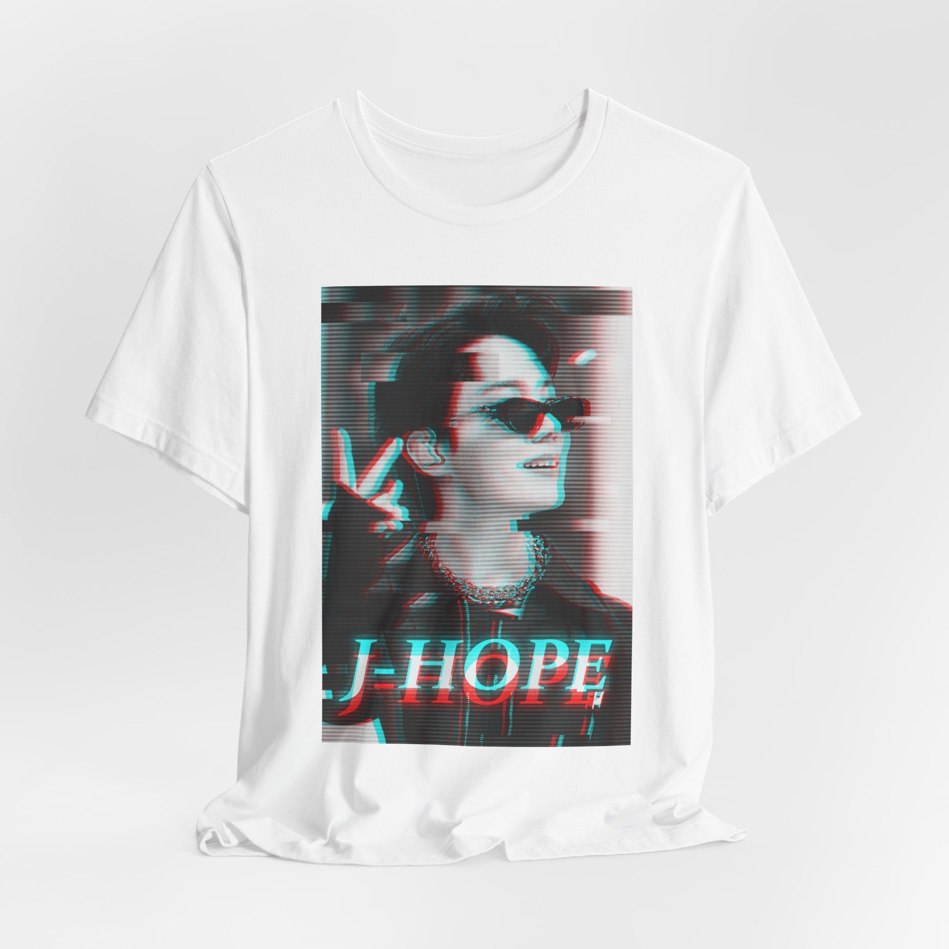 J-Hope BTS unisex T-Shirt with an anaglyph glitch effect, featuring red and cyan 3D hues for a cyberpunk, vintage aesthetic. Draped fit. From ModeKVetements.