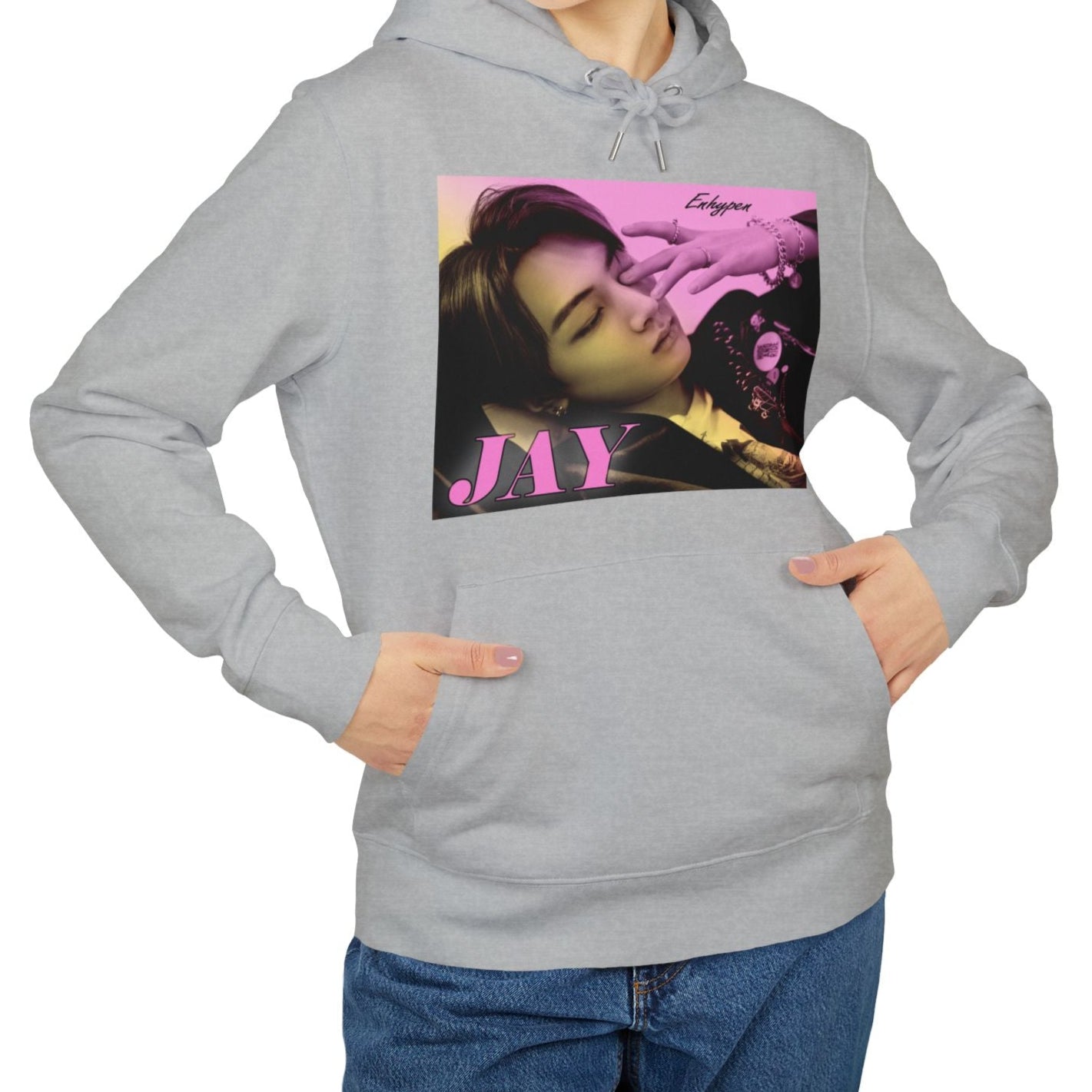 Jay from ENHYPEN on a unisex hoodie in Heather grey, with a soft gradient from lavender rose to jasmine. Serene, dreamy pose with safety pins, rings, and chains. From ModeKVetements.