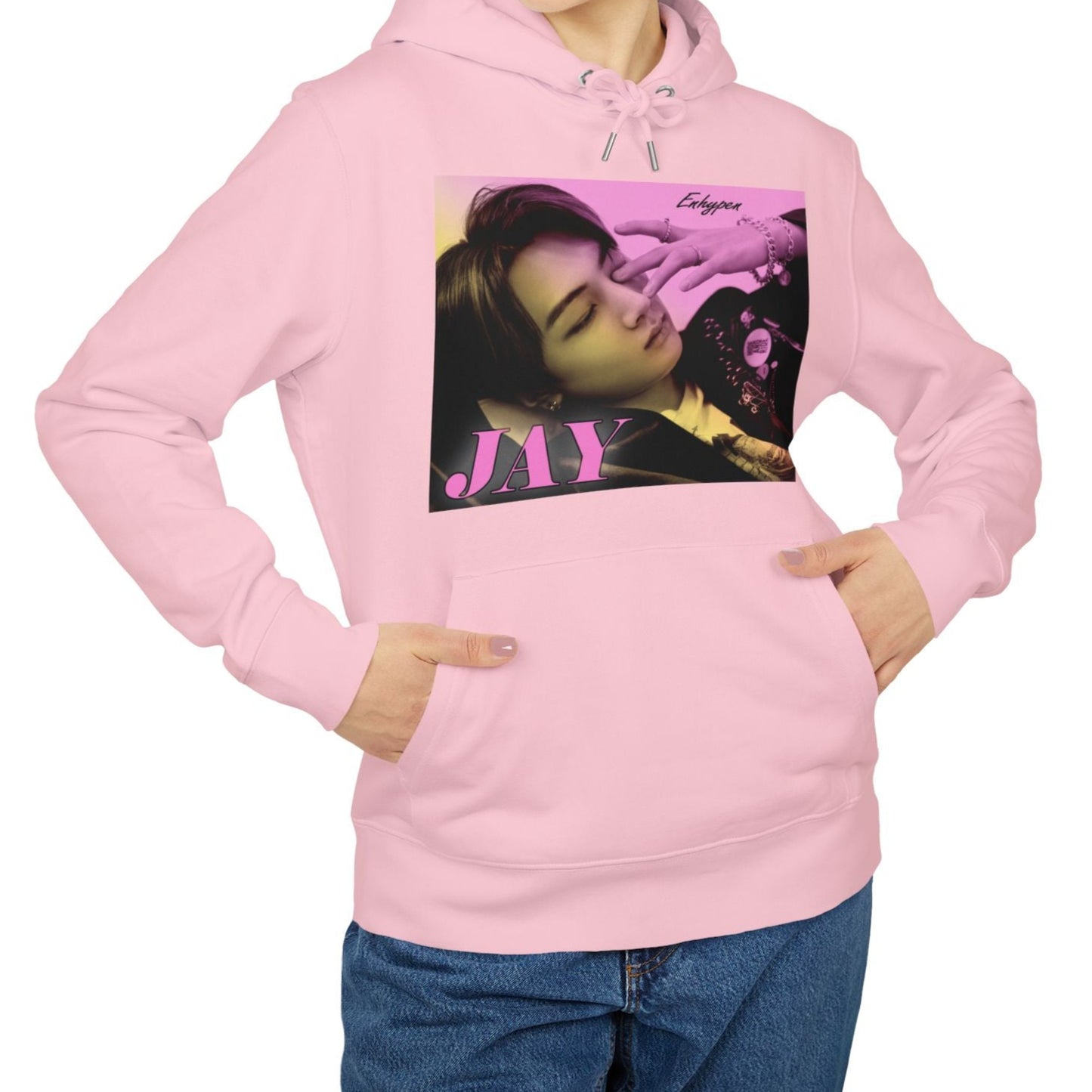 Jay from ENHYPEN on a unisex hoodie in cotton pink, with a soft gradient from lavender rose to jasmine. Serene, dreamy pose with safety pins, rings, and chains. From ModeKVetements.