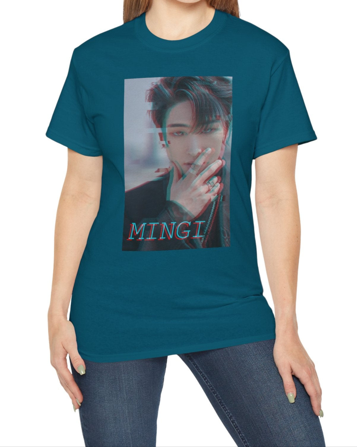 Mingi ATEEZ T-shirt in galapagos blue, featuring a glitch anaglyph design in turquoise and carmine red with scan lines, showing a bold portrait with a piercing gaze and rebellious rings. From ModeK Vetements.