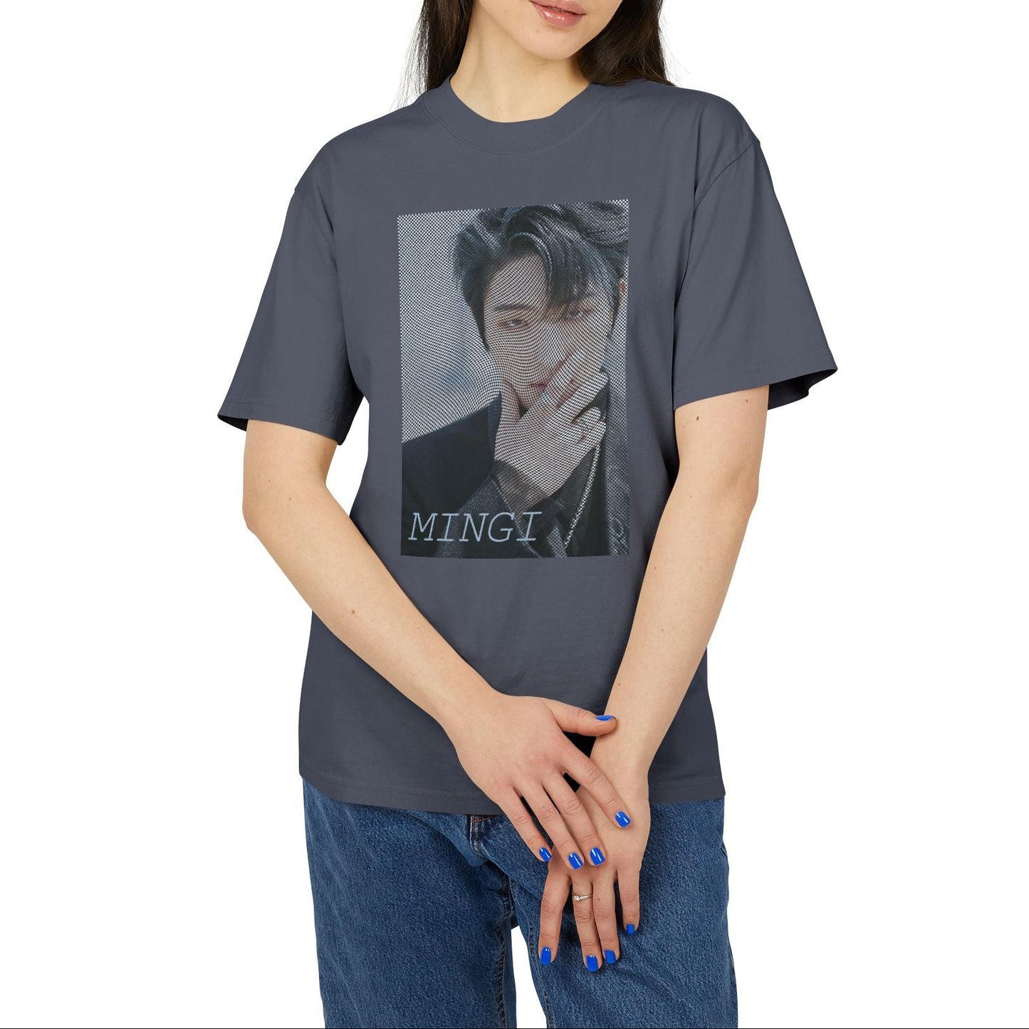 Unisex boxy T-Shirt in faded indigo, featuring a high-contrast graphic portrait of Mingi from the group ATEEZ, overlaid with a dense, wavy halftone moiré pattern. A fine black-and-white grid structure ripples across the image, distorting Mingi’s dark attire to create a powerful three-dimensional optical illusion of digital interference and textured depth. 100% carded cotton from ModeK Vetements.