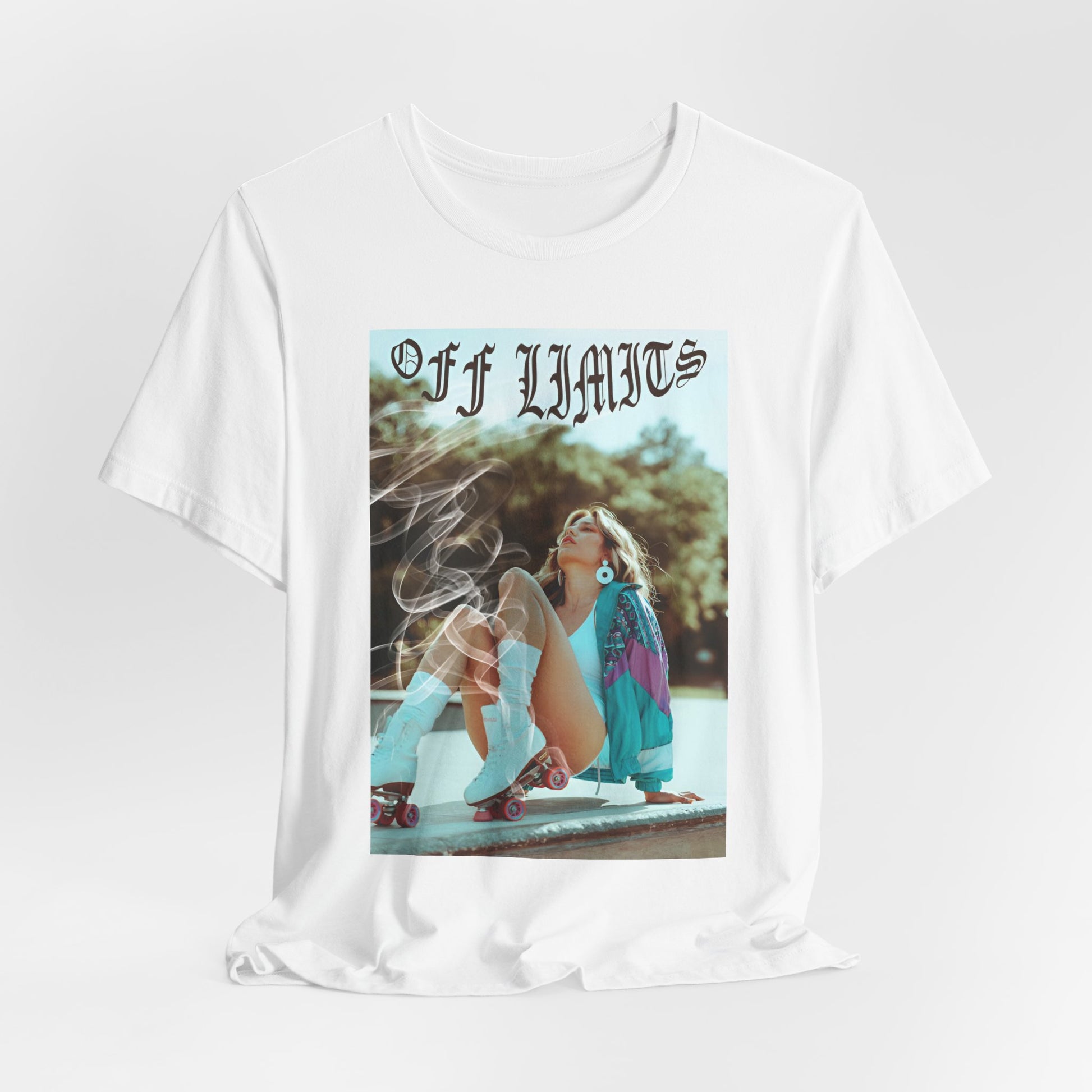 Draped Unisex t-shirt in white, featuring a woman in retro rollerblades with smoke rising from the wheels, resting confidently beneath "Off Limits" in bold gothic font - a statement of freedom and attitude. From ModeK Vetements.