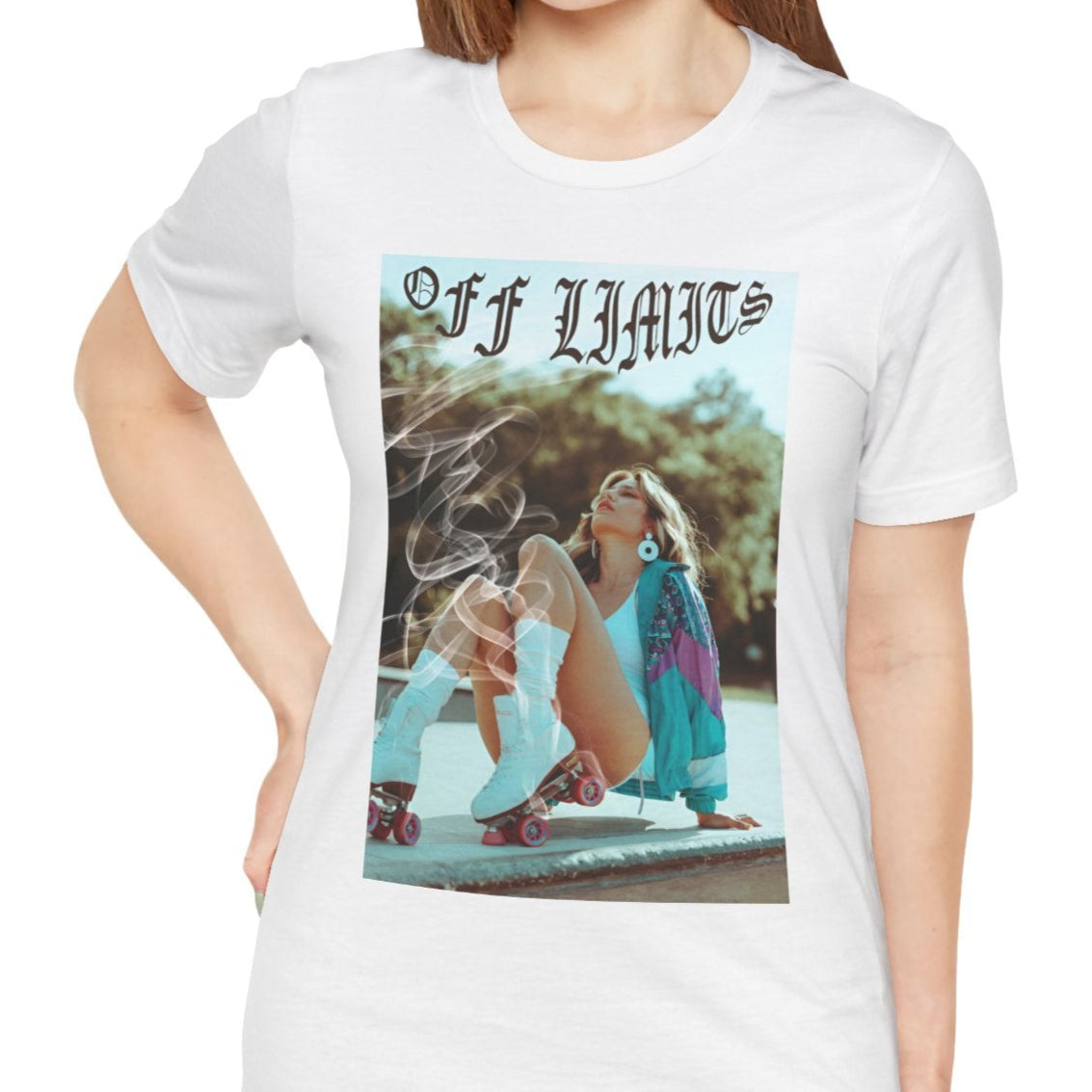 Unisex airlume cotton t-shirt in white, featuring a woman in retro rollerblades with smoke rising from the wheels, resting confidently beneath "Off Limits" in bold gothic font - a statement of freedom and attitude. From ModeK Vetements.