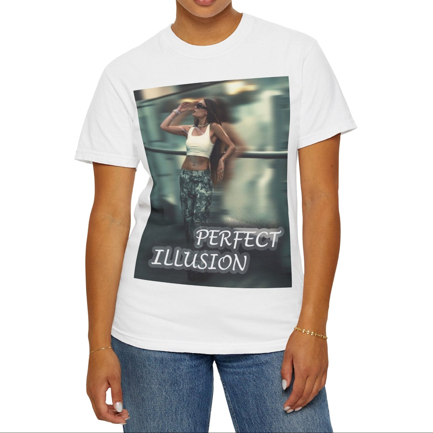 Unisex 100% ring-spun cotton t-shirt in white, featuring a graphic design, where a woman in tactical camo cargo pants and a white crop top stands as a sharp anchor against a blurry, cinematic urban background. The design also features a digital dispersion effect and electric blue rays, symbolizing the "Perfect Illusion" where brute force hides a deeper reality of tenderness and beauty. From ModeK Vetements.