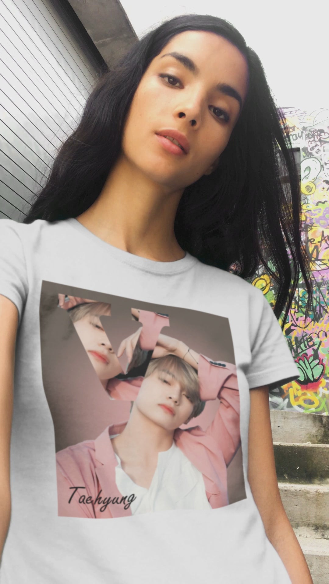 Video showcasing the V BTS Unisex T-Shirt in white – A seamlessly blended design capturing V’s unpredictable, dreamy essence. Aesthetic pink tones enhance his depth and artistic allure. 100% Airlume conbed and ring-spun cotton from ModeK Vetements.