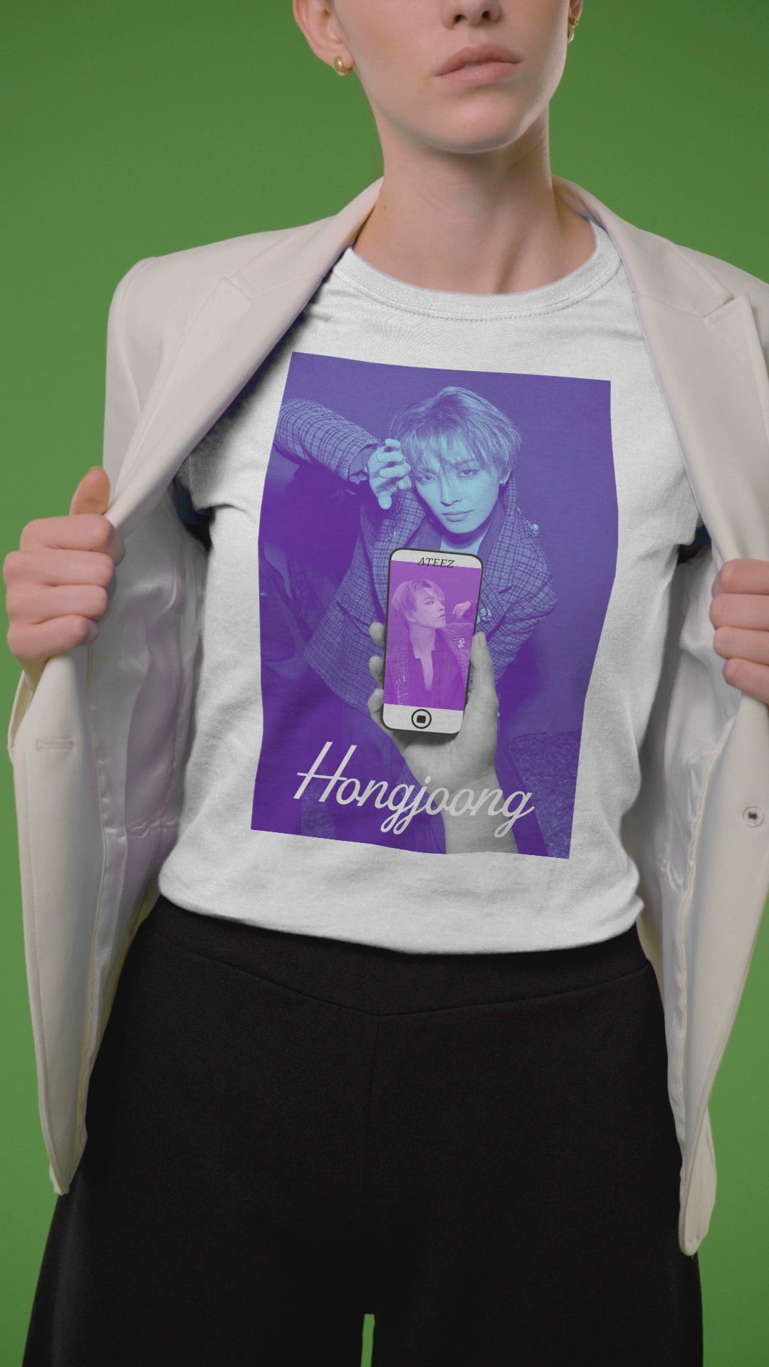 Video showcasing the Unisex t-shirt in white, from airlume combed and ringspun cotton, featuring a Printed design of Hongjoong from ATEEZ in a surreal phone screen composition. The background in blueberry contrasts with a purple-toned image on the phone, evoking alternate perspectives or layered realities. From ModeK Vetements.