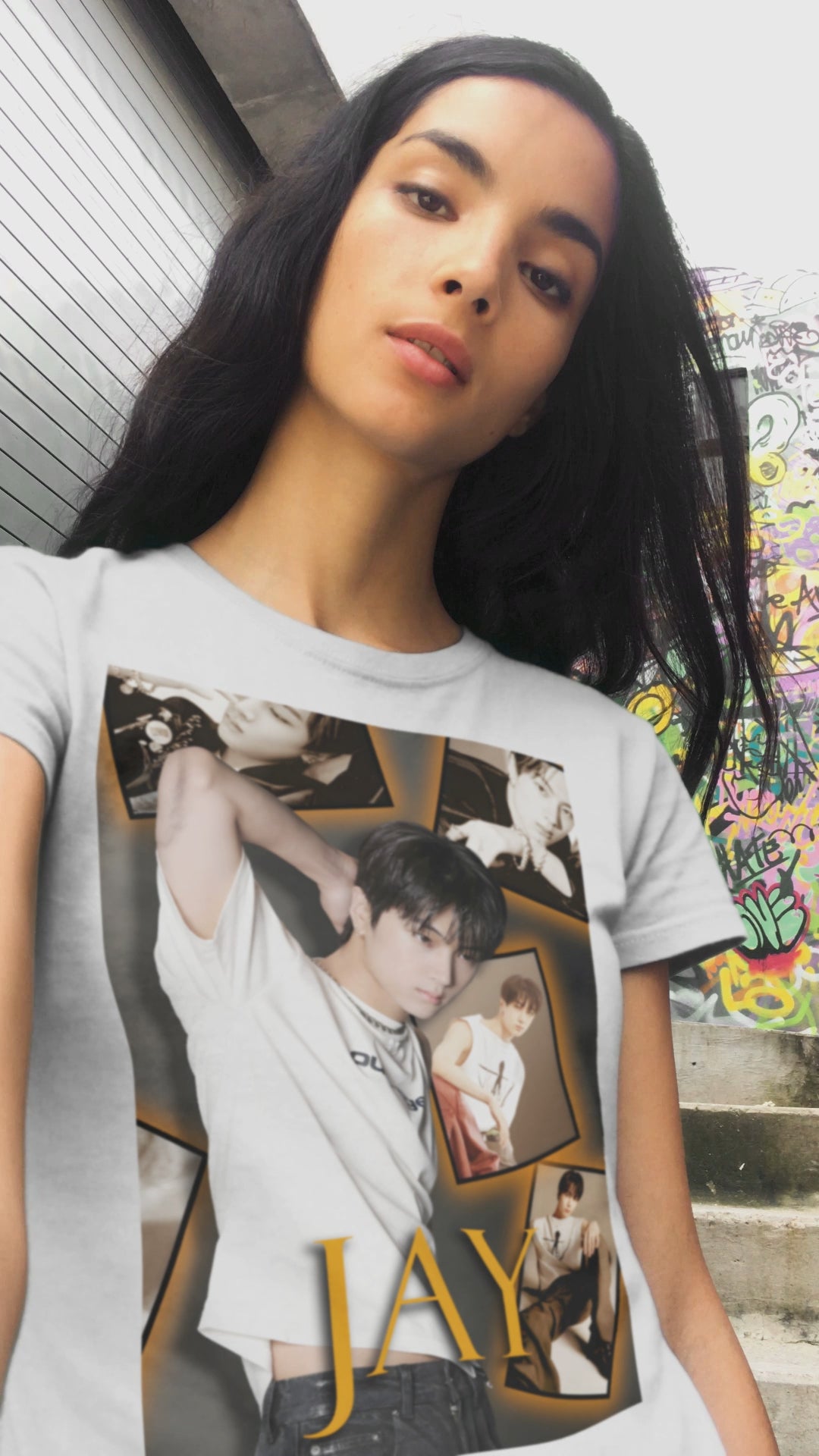 Video showcasing a Unisex T-shirt in white, from 100% Airlume combed and ring-spun cotton, featuring Jay of ENHYPEN layered into a golden moodboard of light, shadow, and black-and-white pictures. From ModeK Vetements.