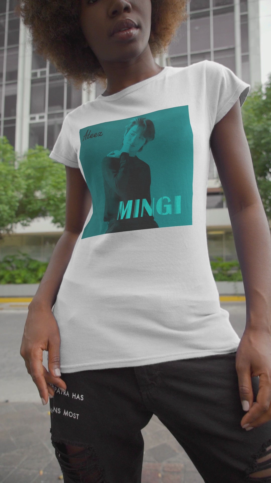 Video showcasing Mingi ATEEZ Unisex T-Shirt featuring a teal cyber glow effect with a digital scan line aesthetic. A bold and futuristic K-pop fashion statement. ModeK Vetements.