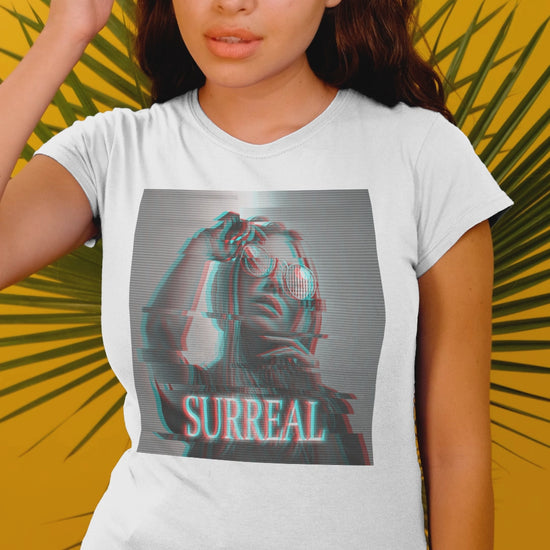 Video showcasing the Surreal unisex T-shirt in white, with red-cyan anaglyph and scan line effects, featuring a woman's soft, glitched silhouette — an illusion caught between memory and reality. From ModeK Vetements.