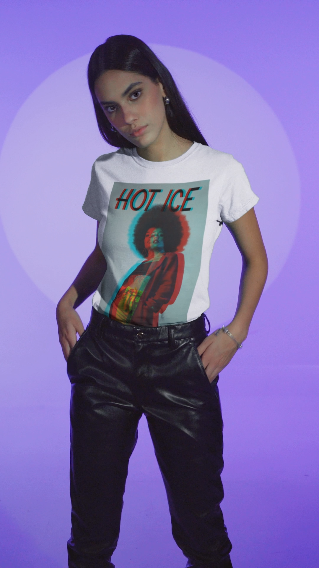 Video showcasing the HOT ICE unisex T-Shirt in white featuring a 3D glitch effect with red and blue overlays, retro-futuristic digital distortion, and bold typography. 100% ringspun cotton from ModeK Vetements.