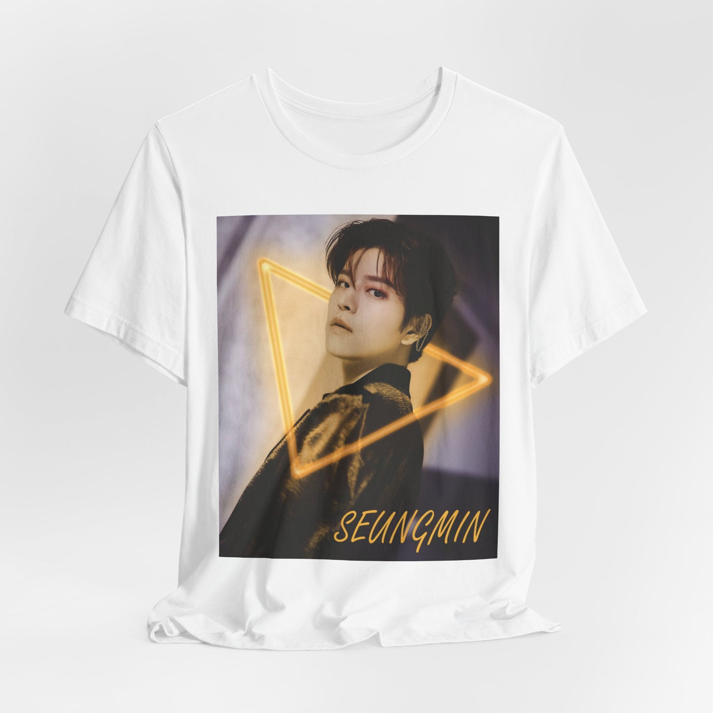 Draped Seungmin Stray Kids Unisex T-Shirt in white– K-pop fan merch with a neon triangle design. His intense gaze invites mystery and style on soft Airlume cotton. ModeK Vetements.