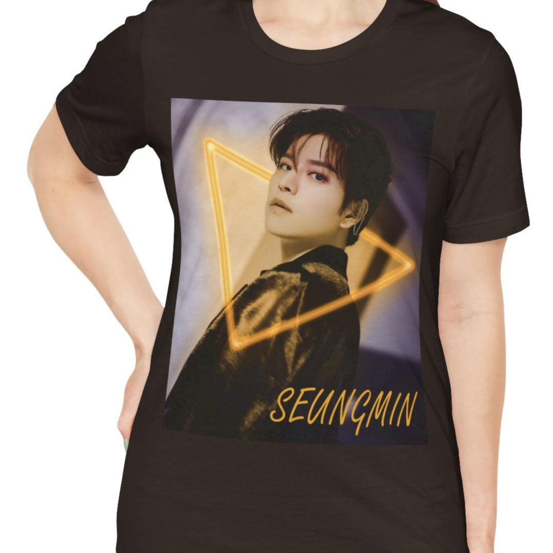 Seungmin Stray Kids Unisex T-Shirt in brown – K-pop fan merch with a neon triangle design. His intense gaze invites mystery and style on soft Airlume cotton. ModeK Vetements.