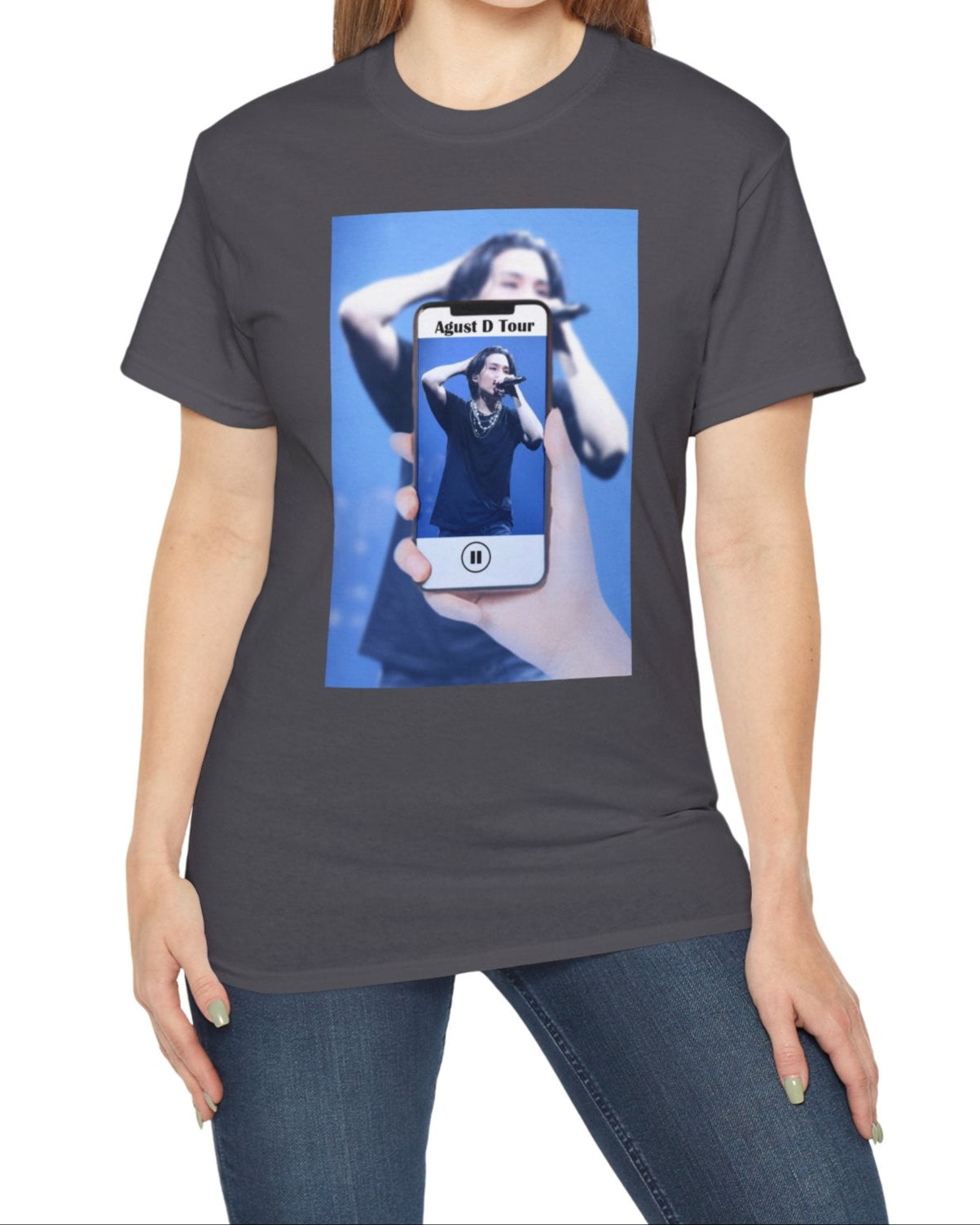 Unisex T-shirt in charcoal, featuring BTS’s SUGA mid-performance during the Agust D Tour, shown through a phone screen with a video player overlay. The foreground is sharp and vivid, while the background is softly blurred. ModeK Vetements. 