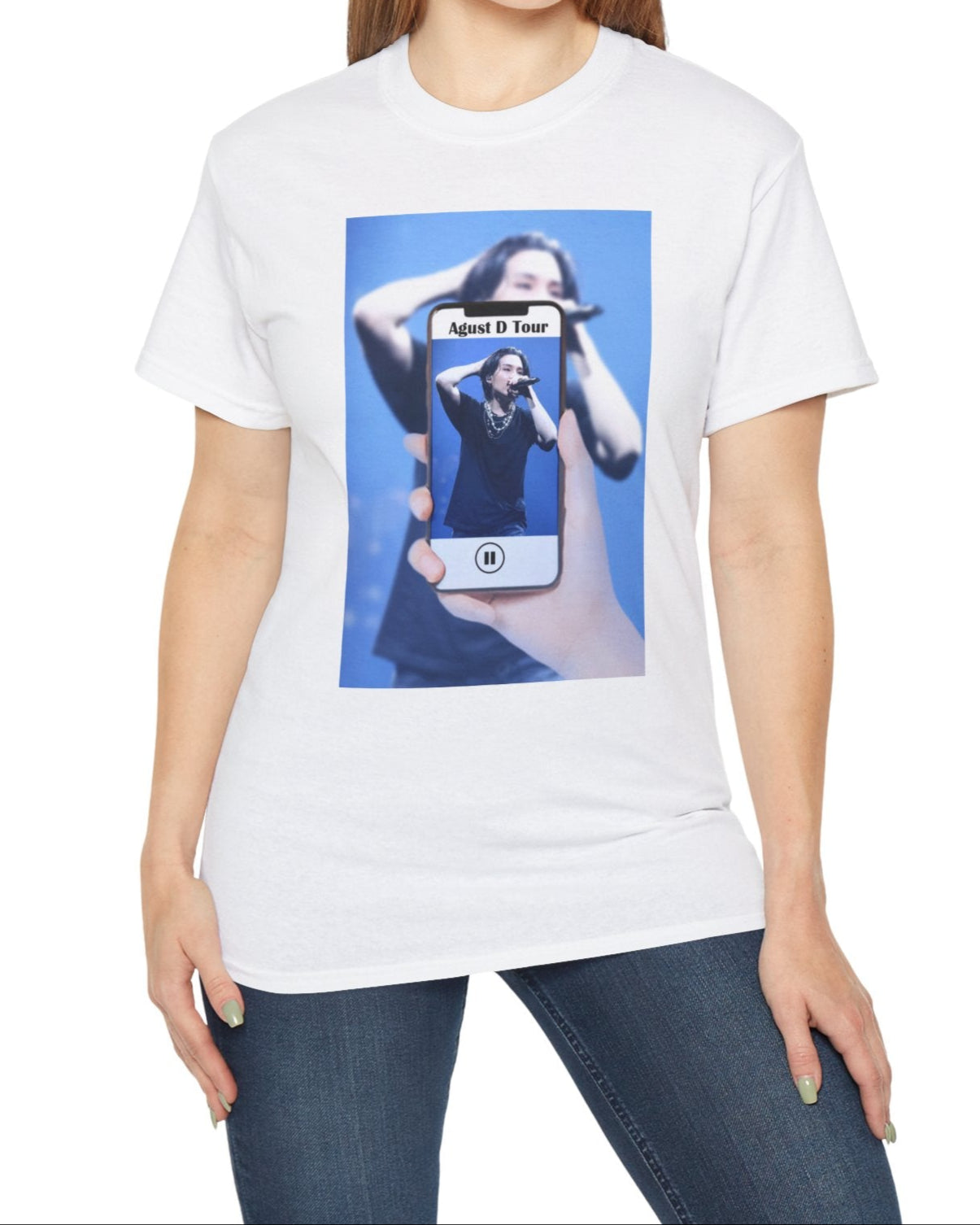 Unisex T-shirt in white, featuring BTS’s SUGA mid-performance during the Agust D Tour, shown through a phone screen with a video player overlay. The foreground is sharp and vivid, while the background is softly blurred. ModeK Vetements. 