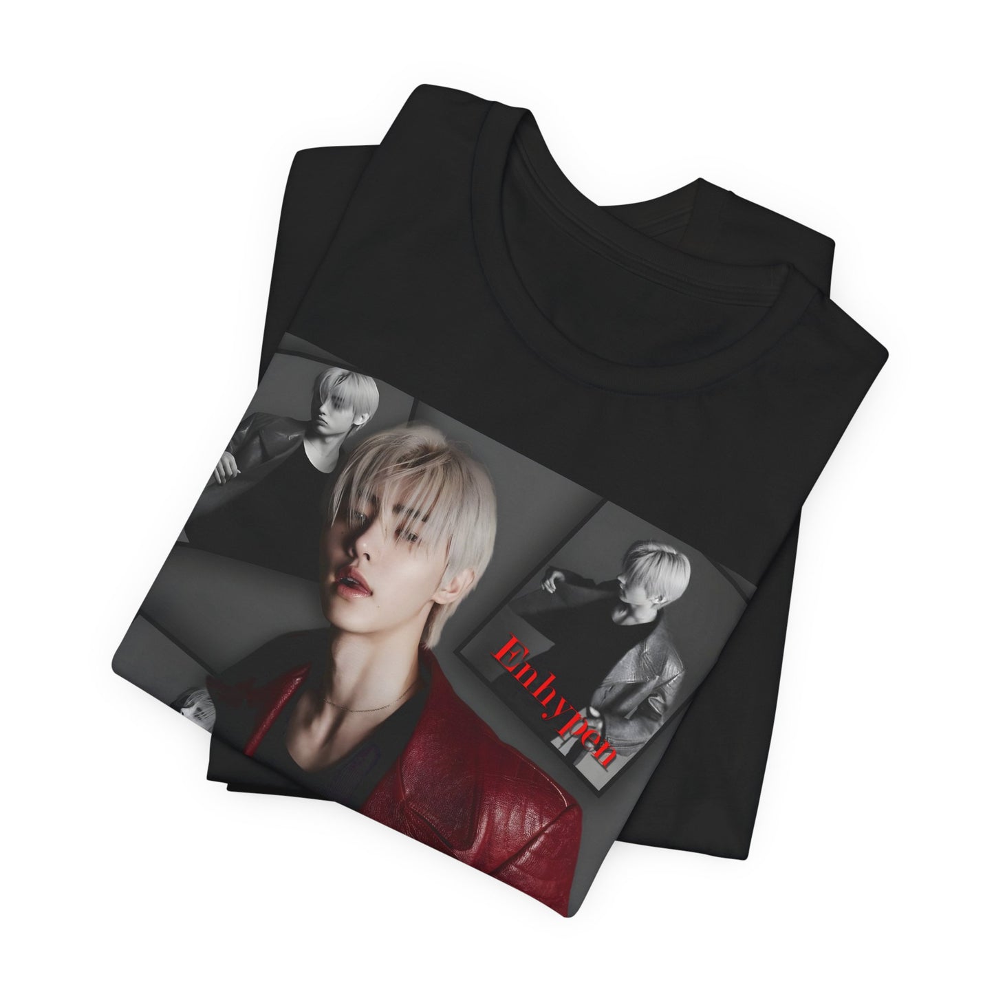 Close-up on the folded unisex airlume combed and ring-spun cotton T-shirt in maroon, featuring Sunghoon of ENHYPEN in a high-fashion monochrome collage. Styled in a red leather jacket, he appears paused mid-glance, framed by cinematic shadows in a Giallo Noir atmosphere. Editorial composition, smooth fabric, soft print finish. From ModeK Vetements.