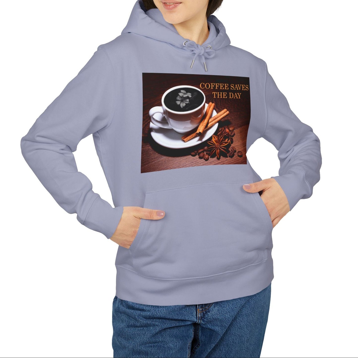 Unisex hoodie in lavender, with front graphic showing a white porcelain coffee cup surrounded by cinnamon sticks, star anise, and coffee beans, with a dark foam surface blooming into a subtle flower shape. 100% organic, combed and ring-spun cotton from ModeK Vetements.