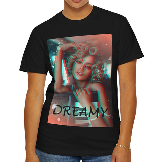 Unisex 100% ring-spun cotton T-Shirt in black featuring a DTG graphic design: a stylized anaglyph portrait of a woman with curly hair, leaning on an electronic keyboard. The design uses a 3D glitch effect with shifting layers of electric blue and bittersweet red-orange, capturing a "DREAMY" cinematic atmosphere. From ModeK Vetements.