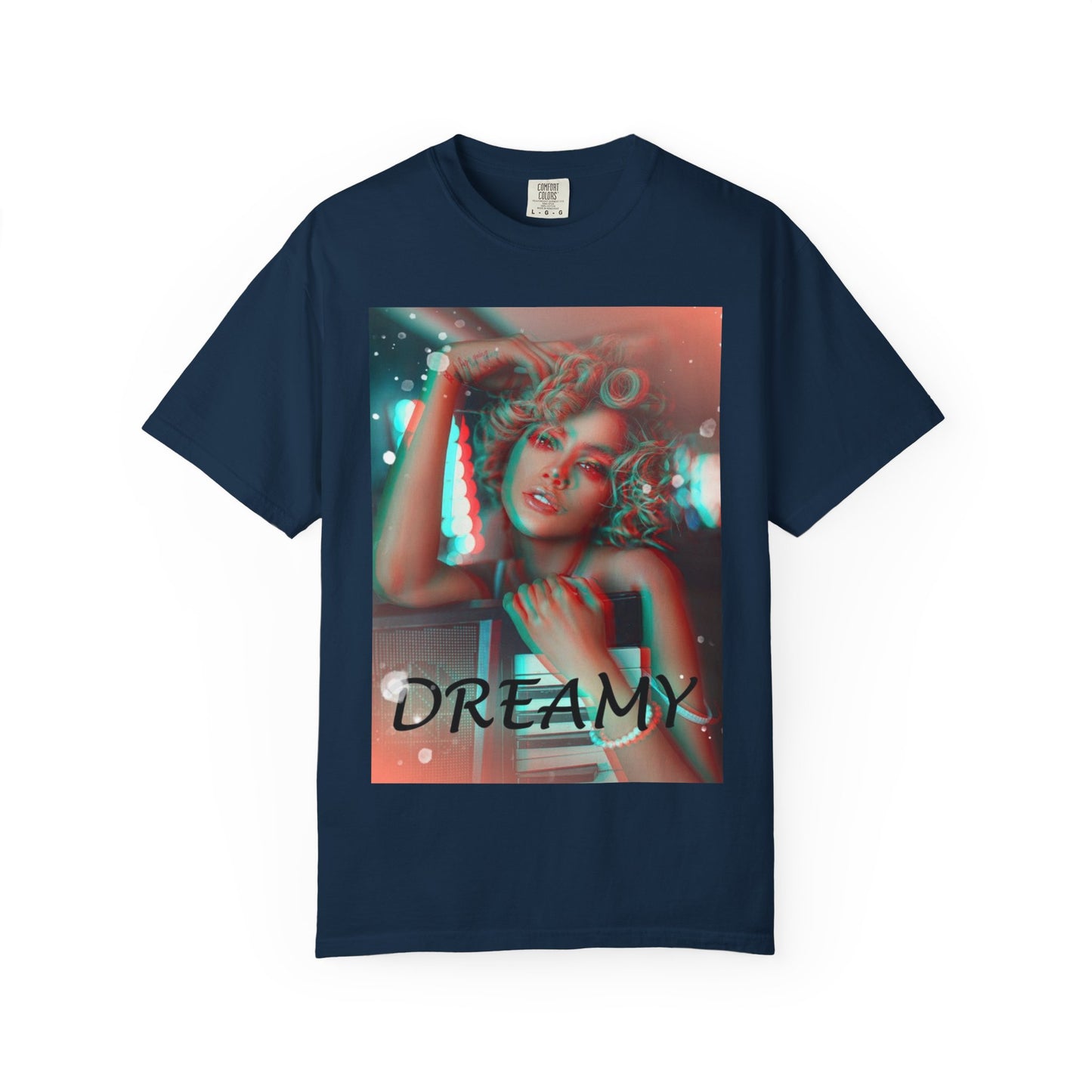Draping unisex 100% ring-spun cotton T-Shirt in true navy featuring a DTG graphic design: a stylized anaglyph portrait of a woman with curly hair, leaning on an electronic keyboard. The design uses a 3D glitch effect with shifting layers of electric blue and bittersweet red-orange, capturing a "DREAMY" cinematic atmosphere. From ModeK Vetements.