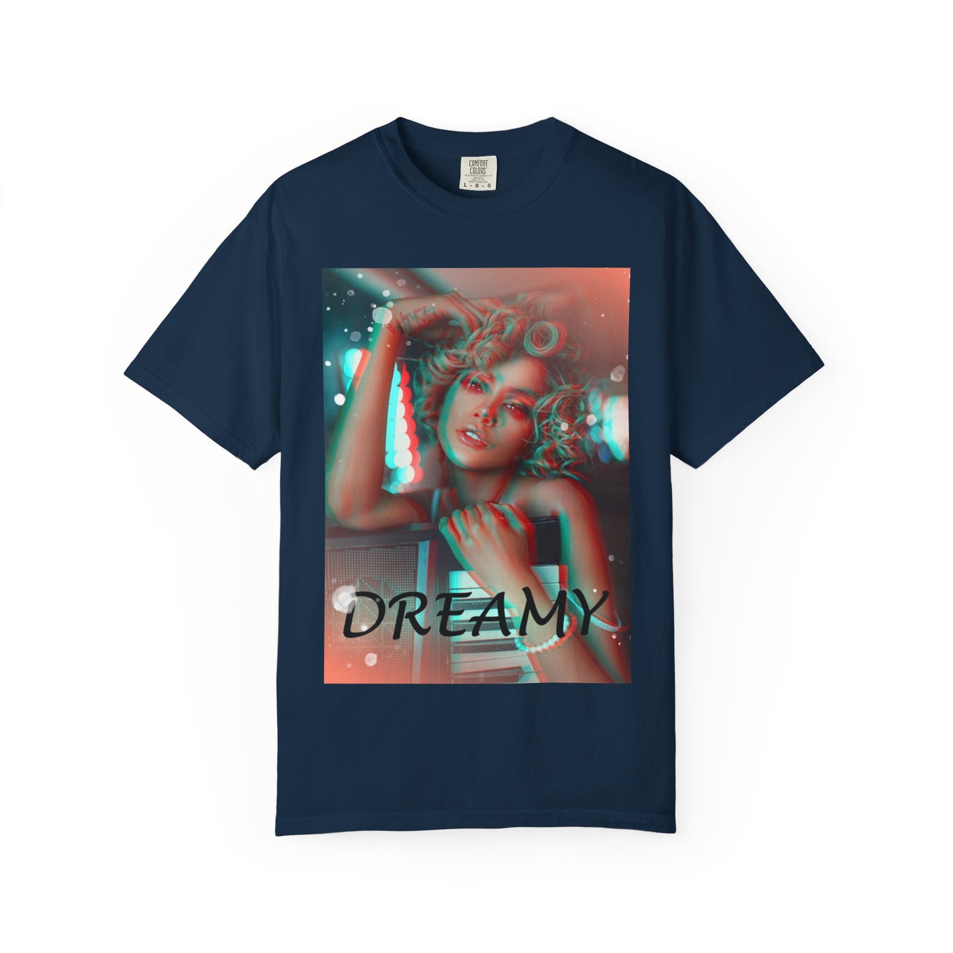 Draping unisex 100% ring-spun cotton T-Shirt in true navy featuring a DTG graphic design: a stylized anaglyph portrait of a woman with curly hair, leaning on an electronic keyboard. The design uses a 3D glitch effect with shifting layers of electric blue and bittersweet red-orange, capturing a "DREAMY" cinematic atmosphere. From ModeK Vetements.