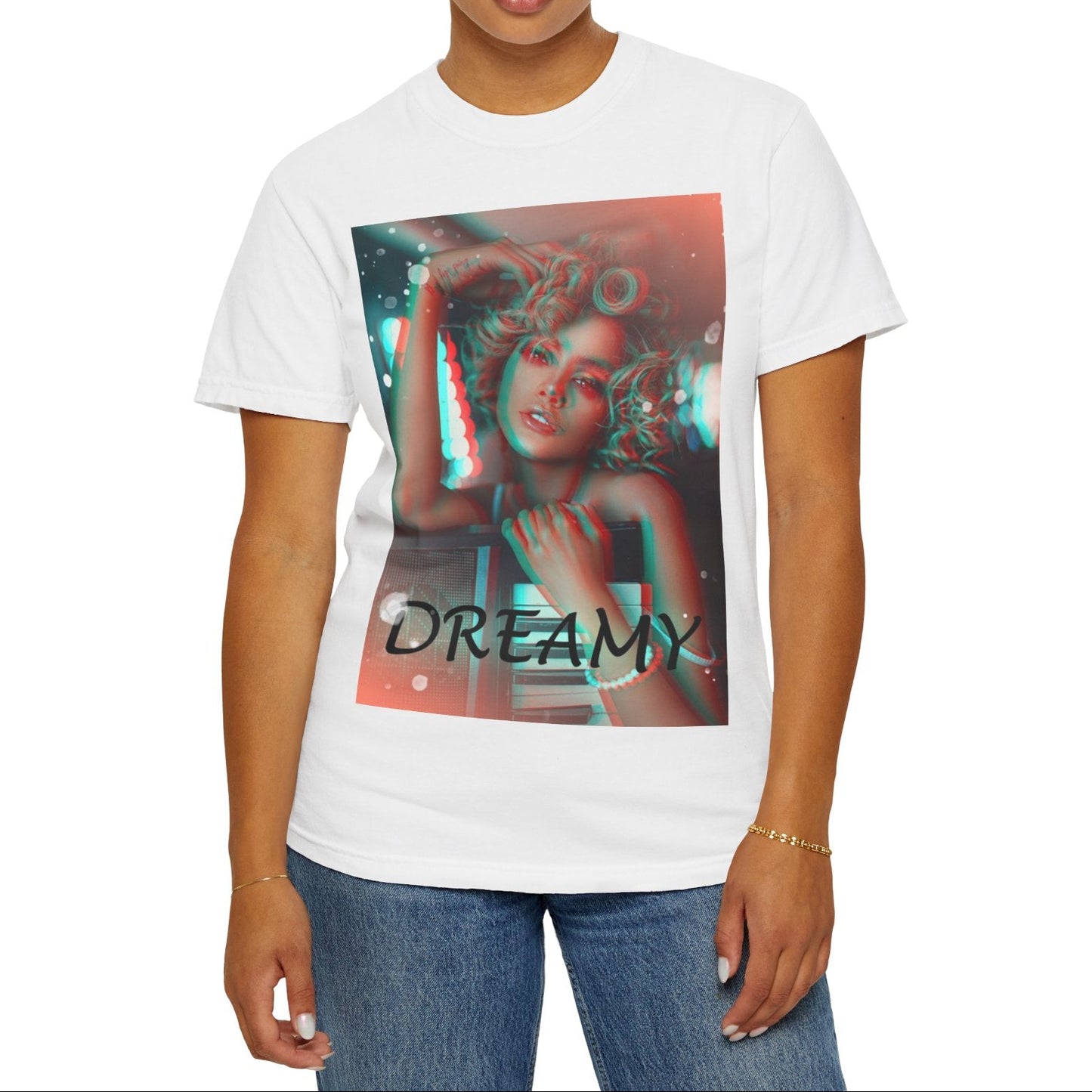 Unisex 100% ring-spun cotton T-Shirt in white featuring a DTG graphic design: a stylized anaglyph portrait of a woman with curly hair, leaning on an electronic keyboard. The design uses a 3D glitch effect with shifting layers of electric blue and bittersweet red-orange, capturing a "DREAMY" cinematic atmosphere. From ModeK Vetements.