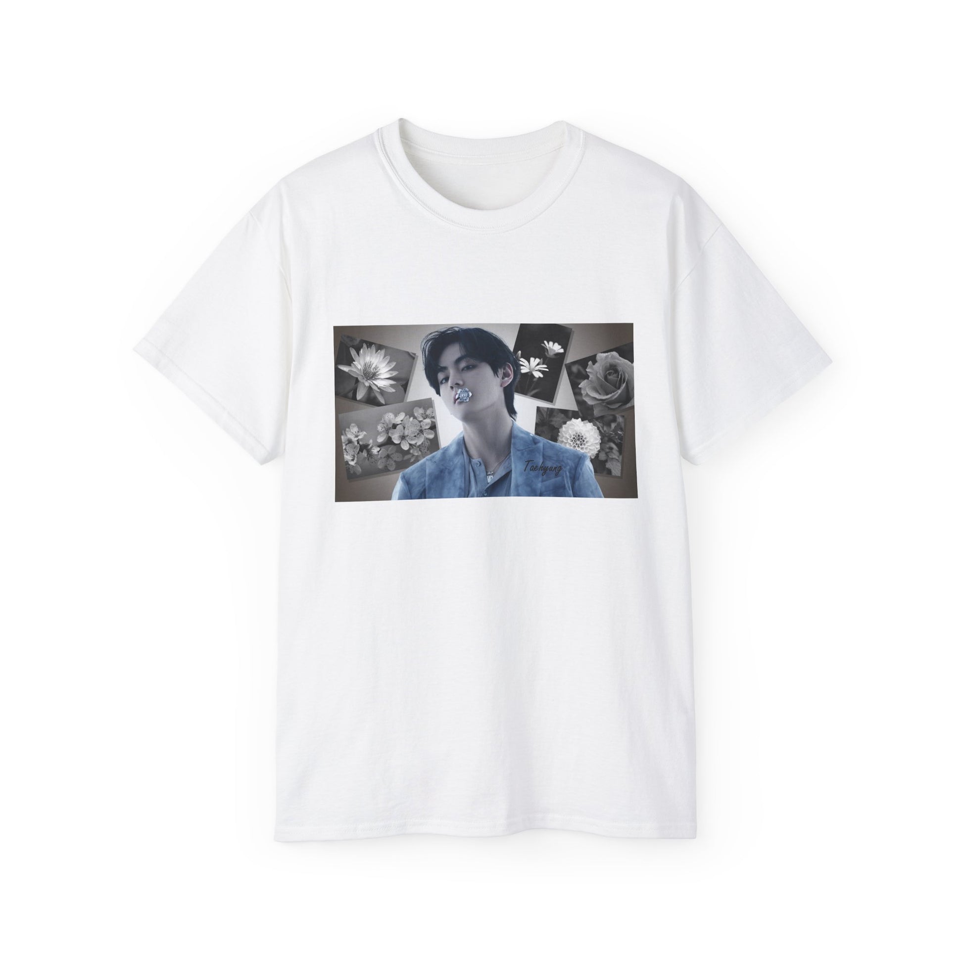 Draped unisex cotton T-shirt in white, featuring a portrait of BTS’s Taehyung (V) holding a blue flower in his mouth, surrounded by grayscale images of a rose, sakura, water lily, dahlia, and rabelera in a collage-style background. ModeK Vetements.