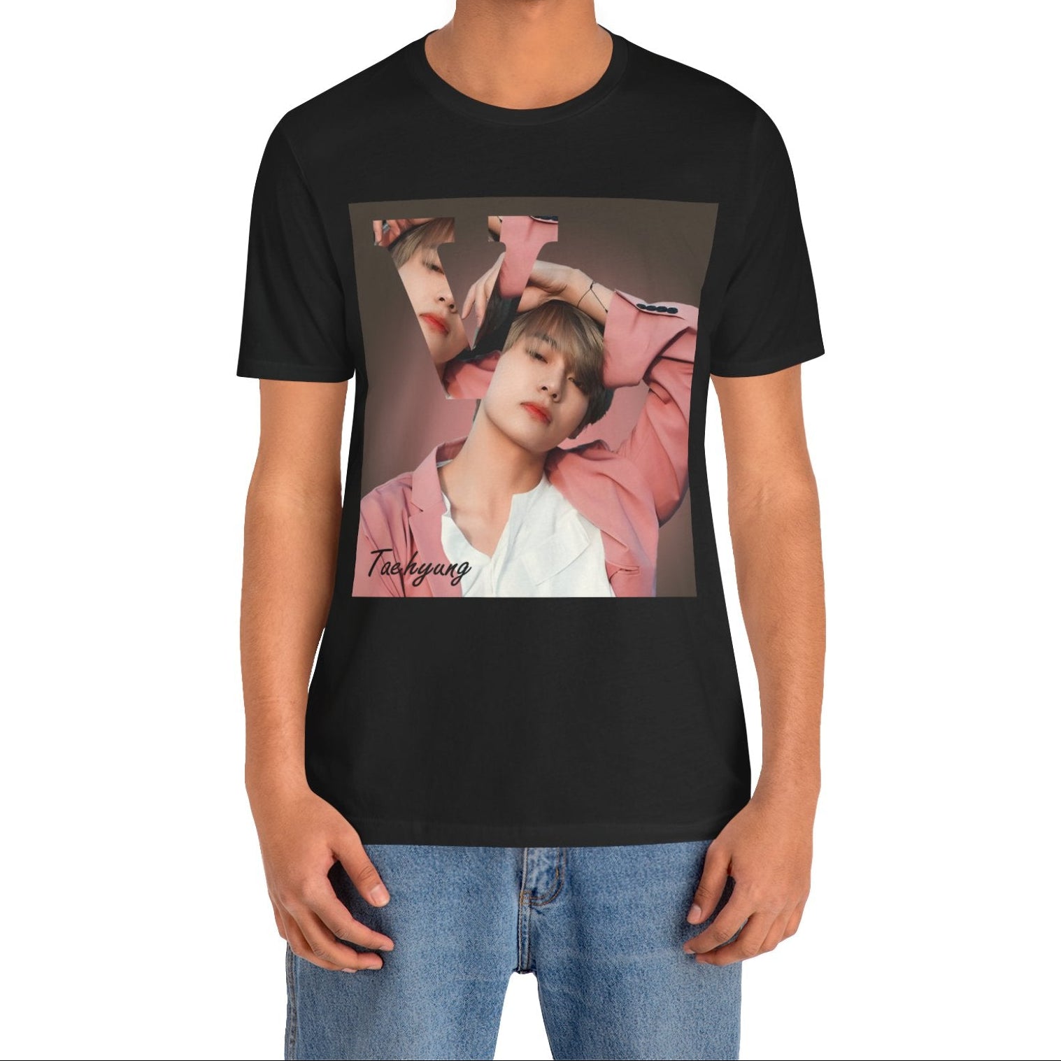 Male model showcasing the V BTS Unisex T-Shirt in black – A seamlessly blended design capturing V’s unpredictable, dreamy essence. Aesthetic pink tones enhance his depth and artistic allure. 100% Airlume conbed and ring-spun cotton from ModeK Vetements.
