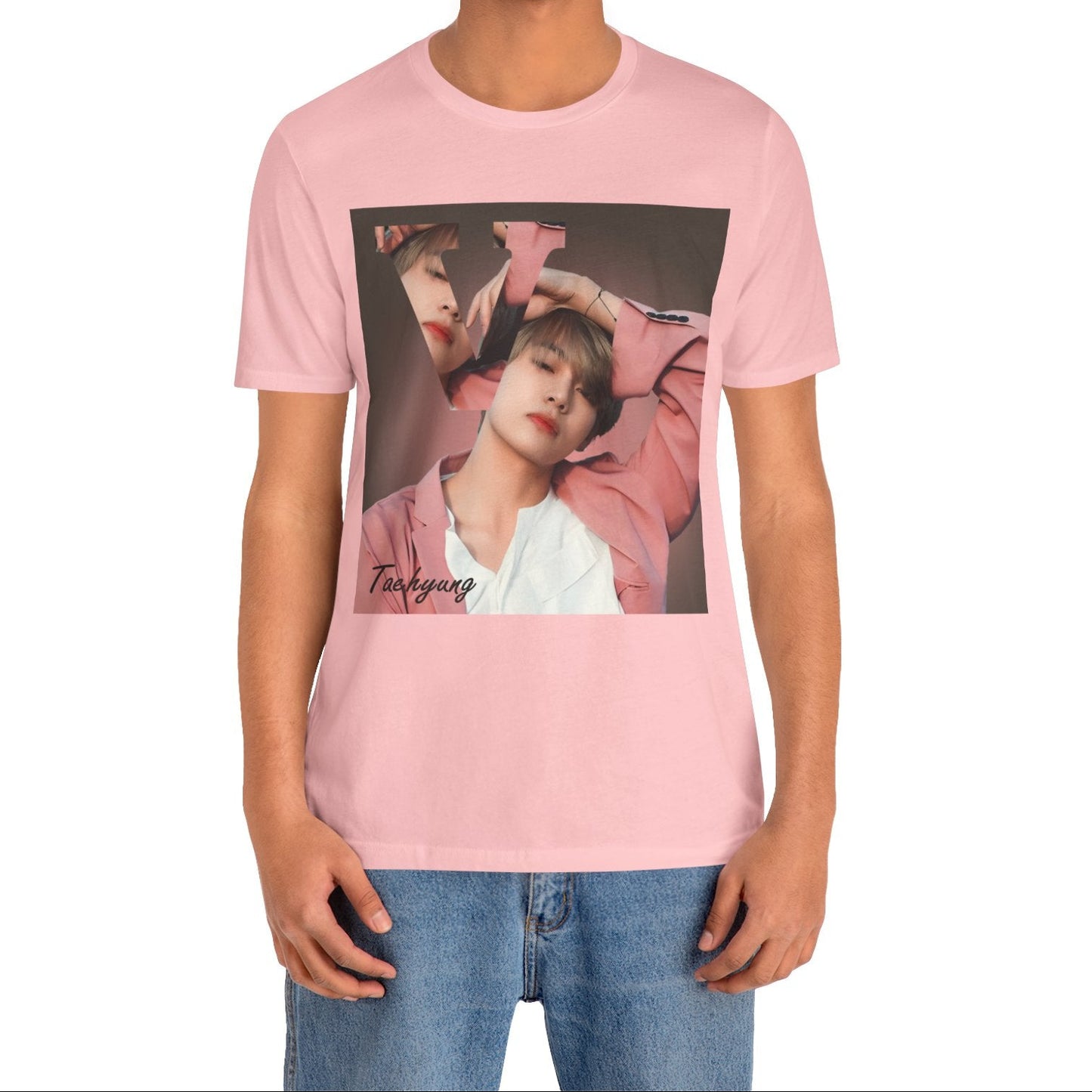 Male model showcasing the V BTS Unisex T-Shirt in pink – A seamlessly blended design capturing V’s unpredictable, dreamy essence. Aesthetic pink tones enhance his depth and artistic allure. 100% Airlume conbed and ring-spun cotton from ModeK Vetements.