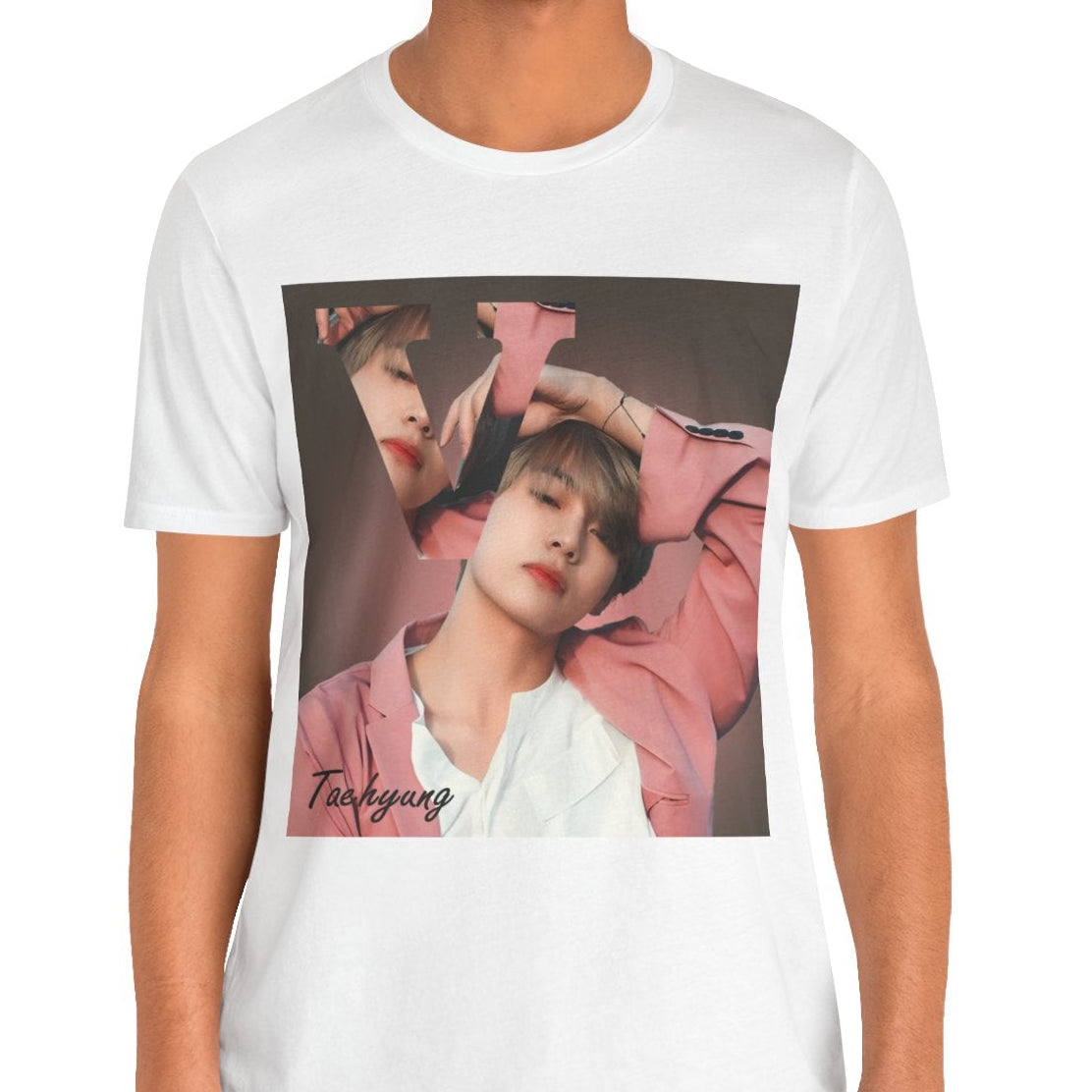 Male model showcasing the V BTS Unisex T-Shirt in white – A seamlessly blended design capturing V’s unpredictable, dreamy essence. Aesthetic pink tones enhance his depth and artistic allure. 100% Airlume conbed and ring-spun cotton from ModeK Vetements.