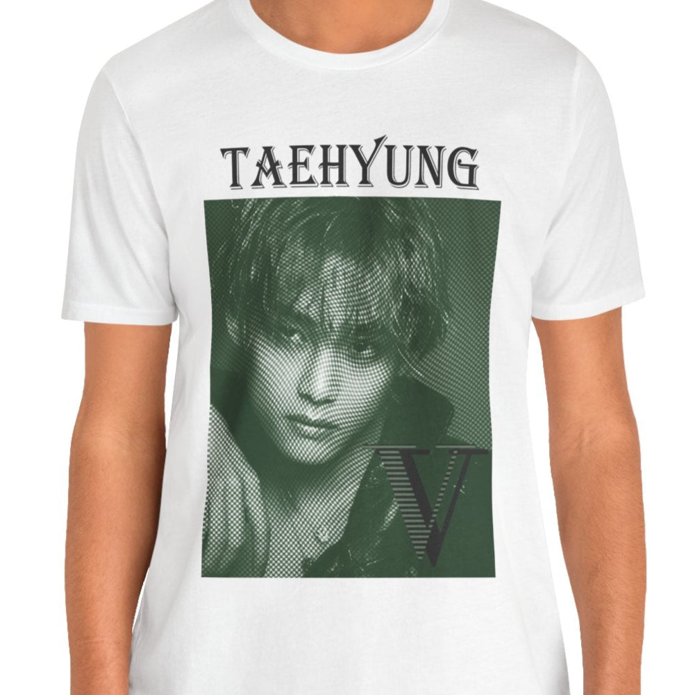 V Taehyung BTS unisex T-shirt in white, featuring a vintage money engraving effect on a deep green-toned portrait. The design blends classic elegance with modern artistic detail, creating a bold yet sophisticated look. Made from 100% Airlume cotton for lightweight comfort. From ModeKVetements.