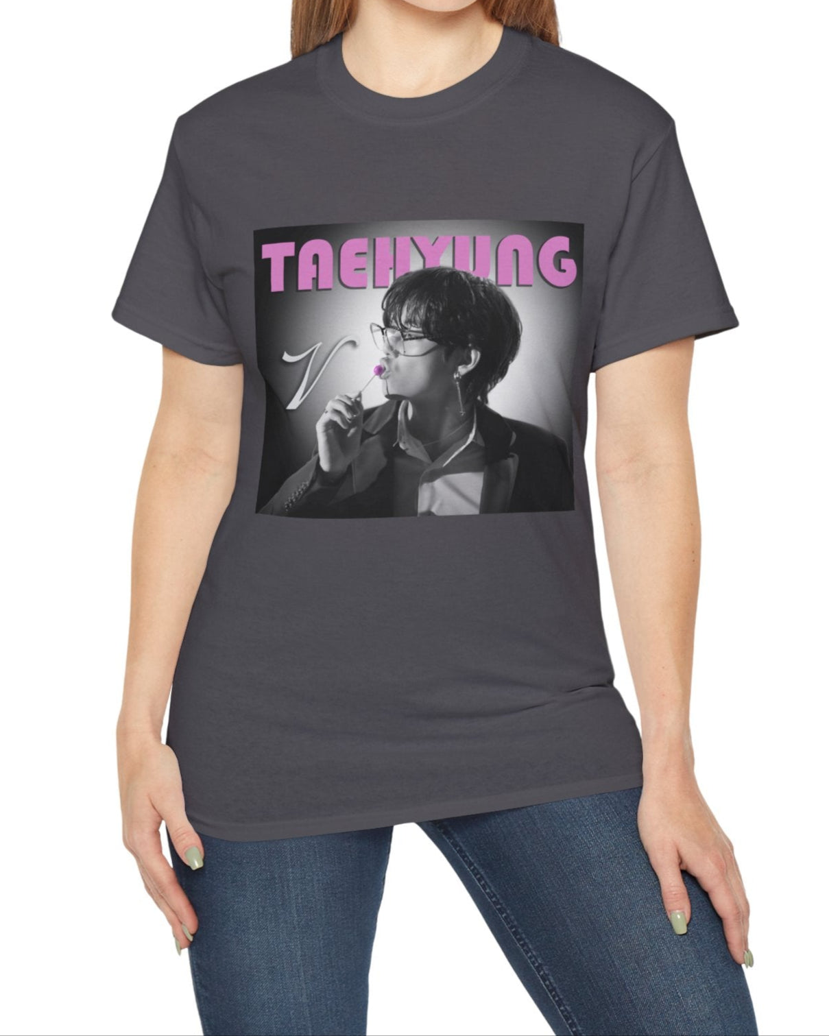 V Taehyung BTS unisex t-shirt in charcoal, featuring a black-and-white design with a pink lollipop and vintage pink lettering. Printed on 100% US cotton, ethically made and Oeko-Tex certified. ModeK Vetements.