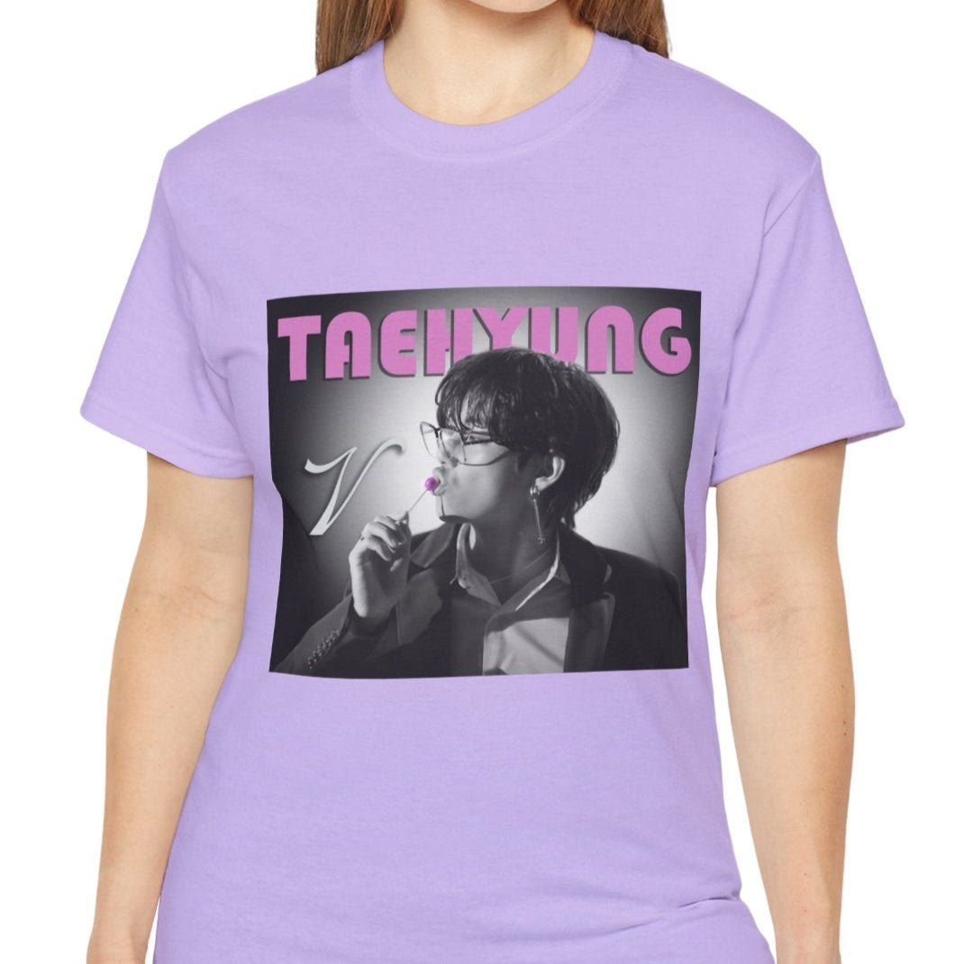 V Taehyung BTS unisex t-shirt in orchid, featuring a black-and-white design with a pink lollipop and vintage pink lettering. Printed on 100% US cotton, ethically made and Oeko-Tex certified. ModeK Vetements.